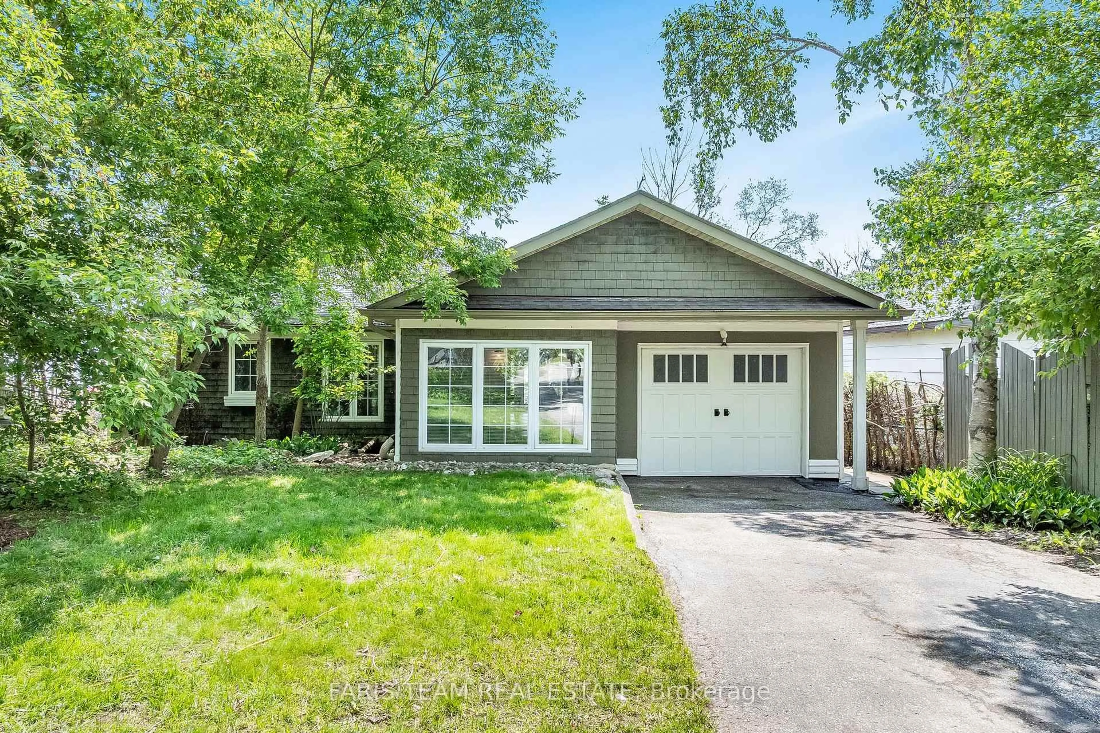 Home with vinyl exterior material, street for 1075 Lakeshore Rd, Oro-Medonte Ontario L0L 1T0