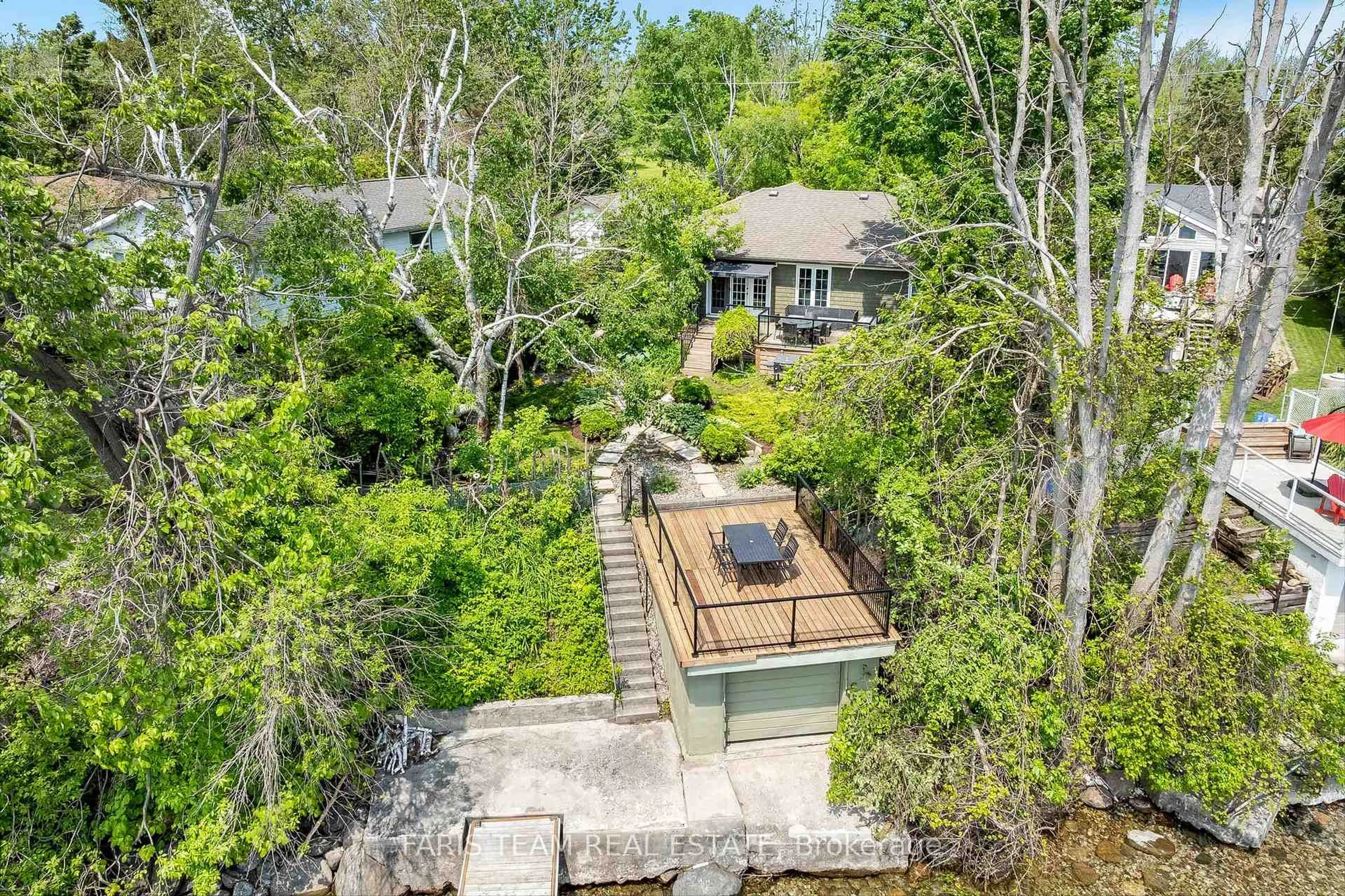 A pic from outside/outdoor area/front of a property/back of a property/a pic from drone, water/lake/river/ocean view for 1075 Lakeshore Rd, Oro-Medonte Ontario L0L 1T0