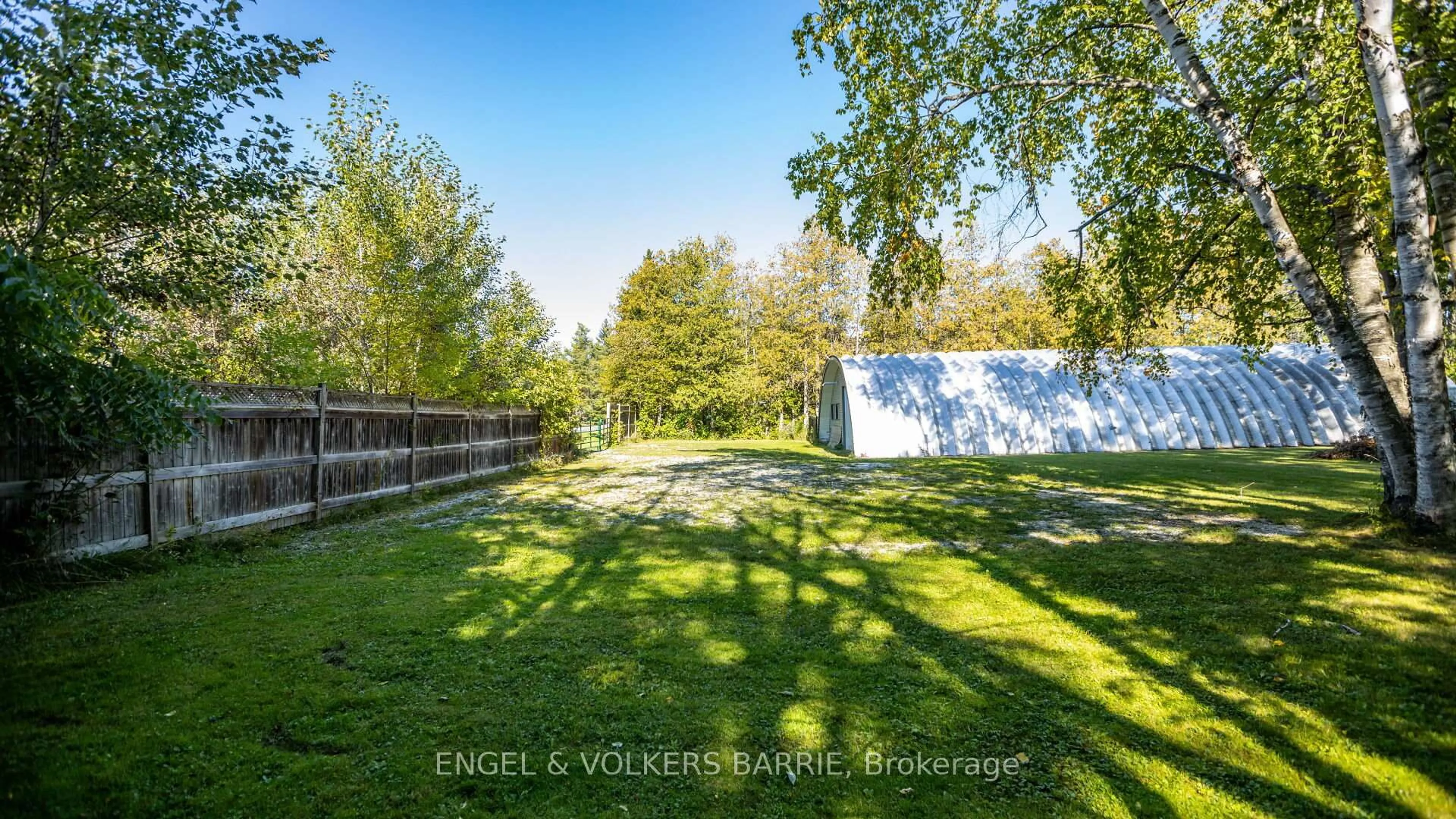 A pic from outside/outdoor area/front of a property/back of a property/a pic from drone, forest/trees view for 112 Lakeshore Rd, Oro-Medonte Ontario L0L 2E0