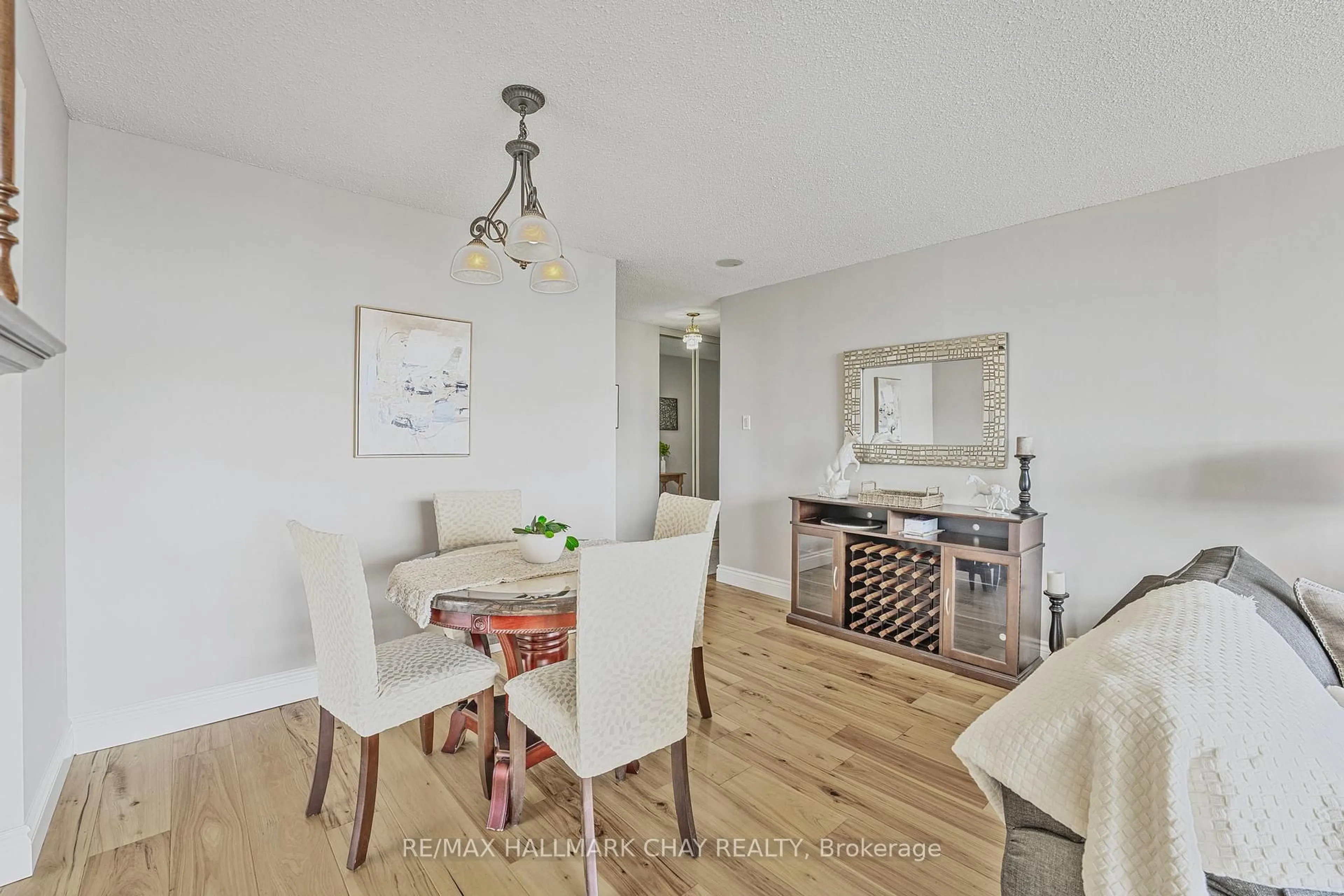 Dining room, wood/laminate floor for 65 Ellen St #610, Barrie Ontario L4N 3A5