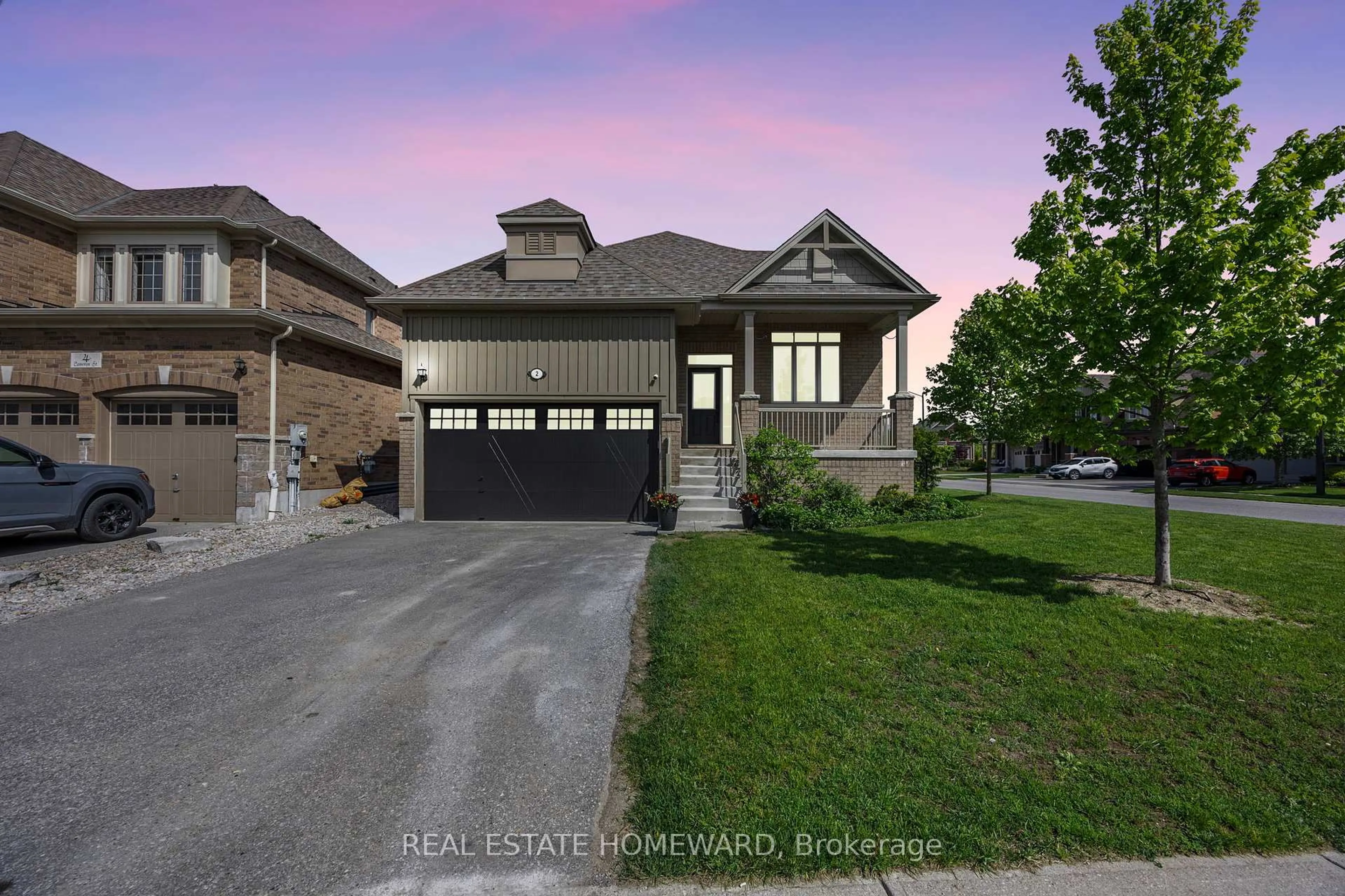 Home with brick exterior material, street for 2 Cameron St, Springwater Ontario L9X 0S5