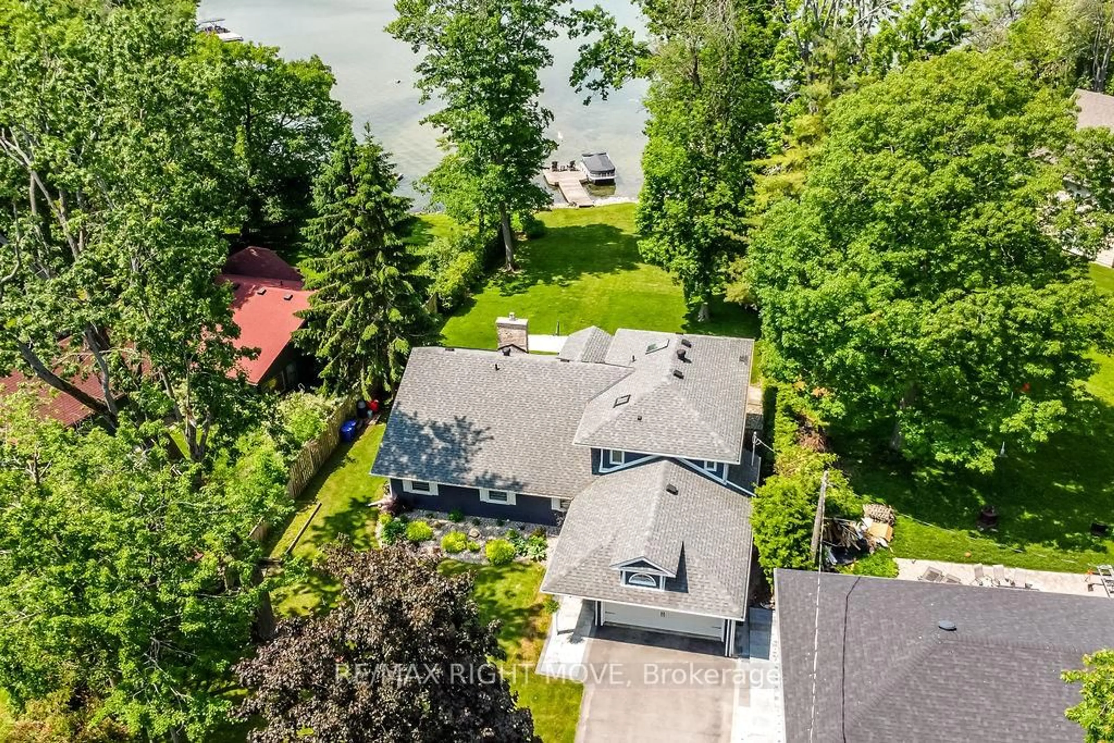 A pic from outside/outdoor area/front of a property/back of a property/a pic from drone, water/lake/river/ocean view for 668 Broadview Ave, Orillia Ontario L3V 6P2