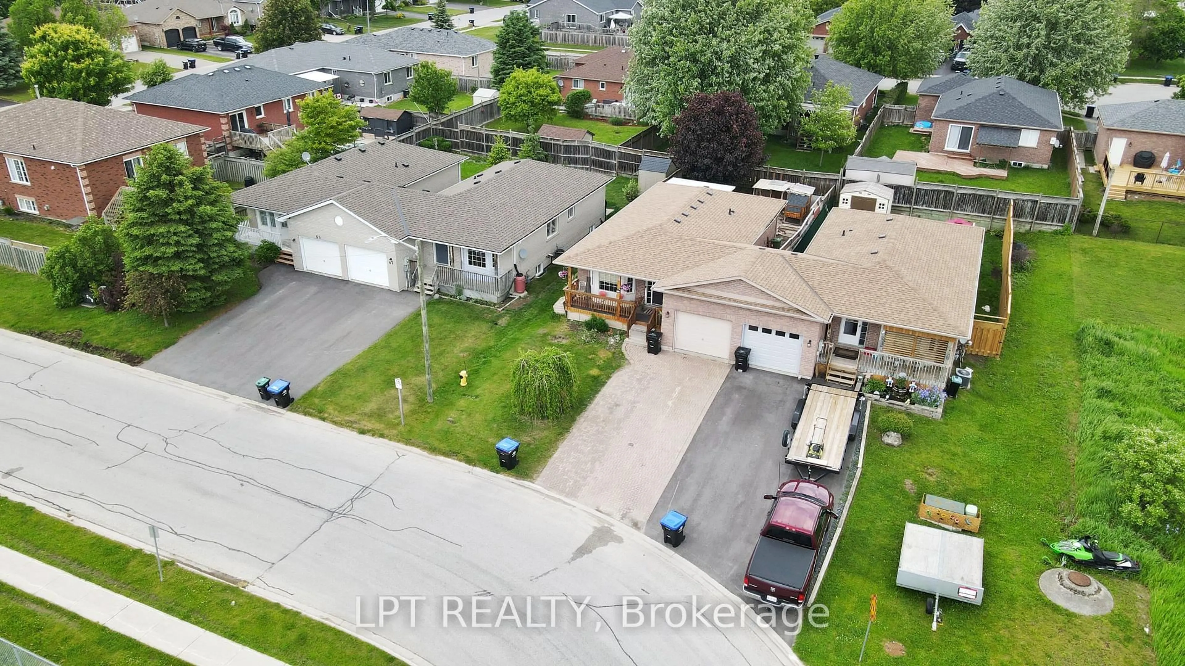 A pic from outside/outdoor area/front of a property/back of a property/a pic from drone, street for 69 Simcoe St, Springwater Ontario L0L 1P0