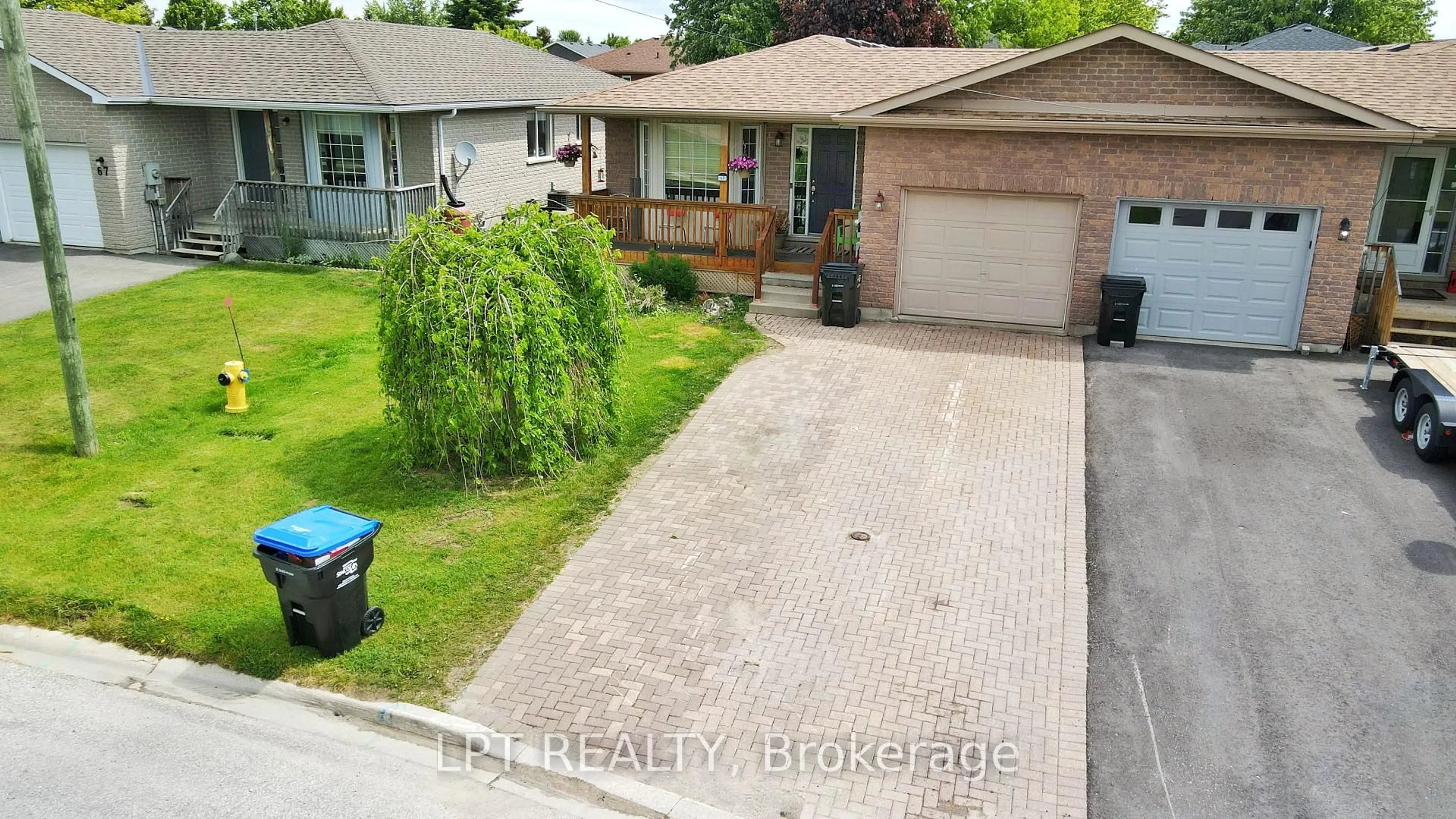 A pic from outside/outdoor area/front of a property/back of a property/a pic from drone, street for 69 Simcoe St, Springwater Ontario L0L 1P0