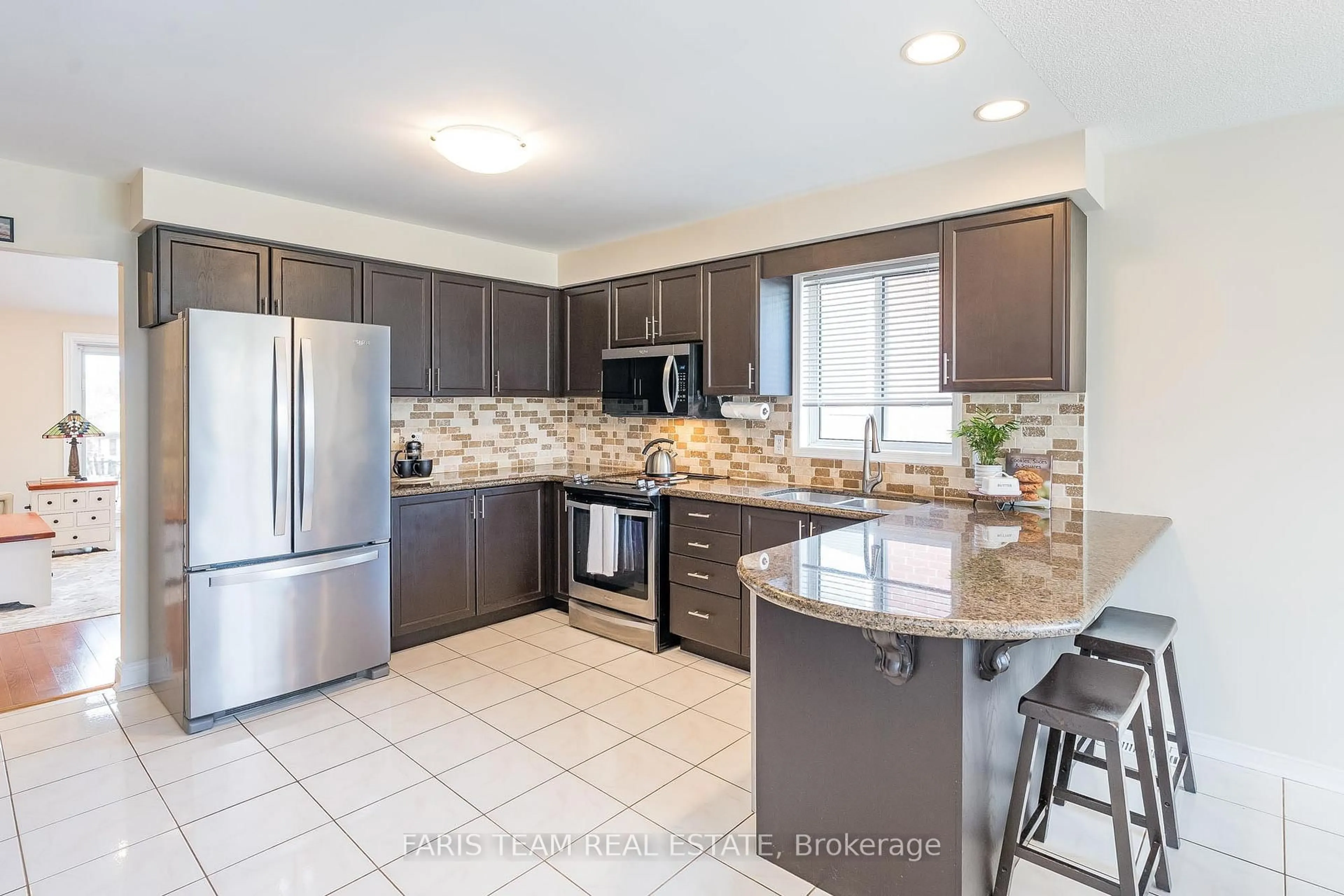 Open concept kitchen, ceramic/tile floor for 302 Cox Mill Rd, Barrie Ontario L4N 8V3