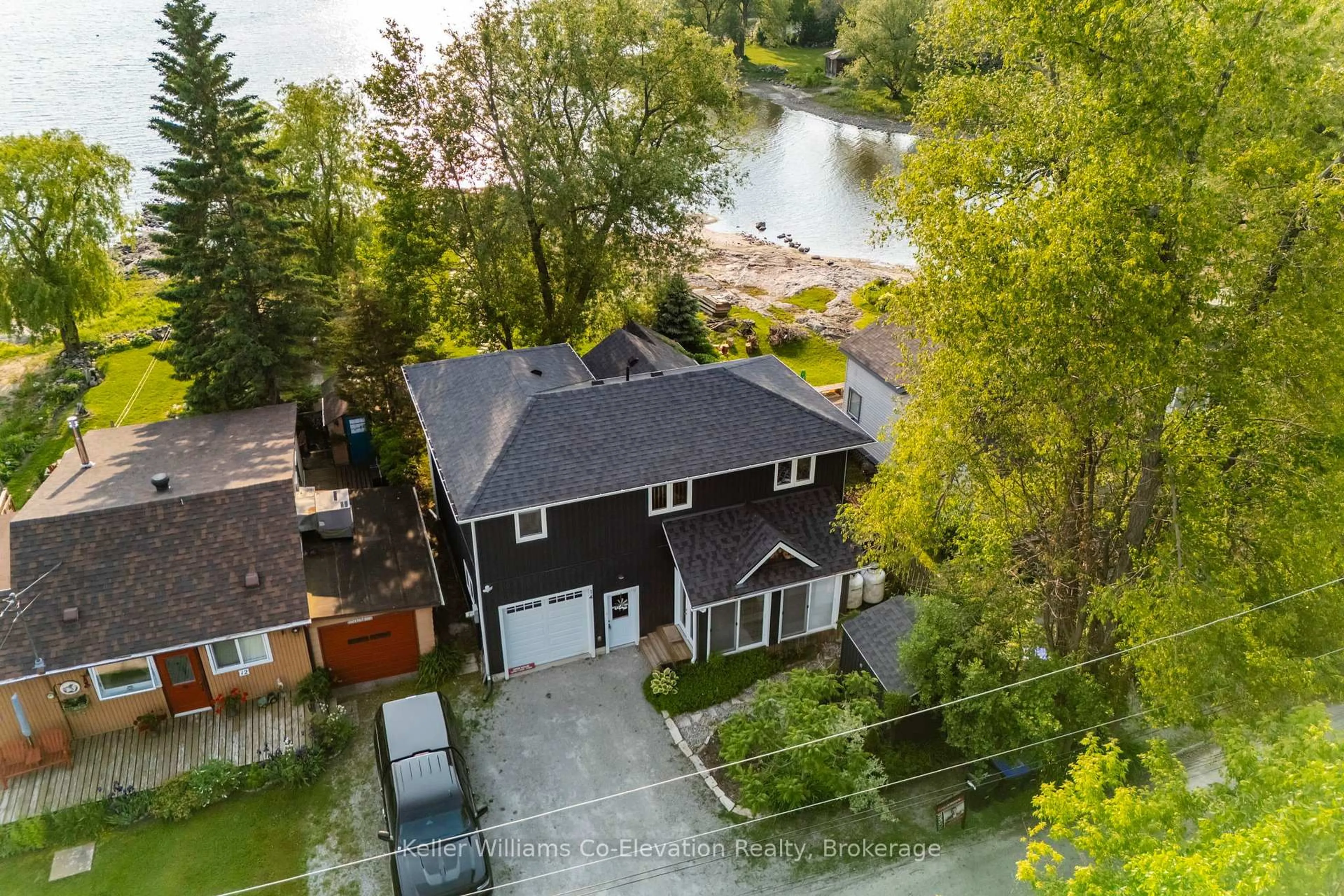 A pic from outside/outdoor area/front of a property/back of a property/a pic from drone, water/lake/river/ocean view for 14 Long Point Rd, Tay Ontario P2A 0B2