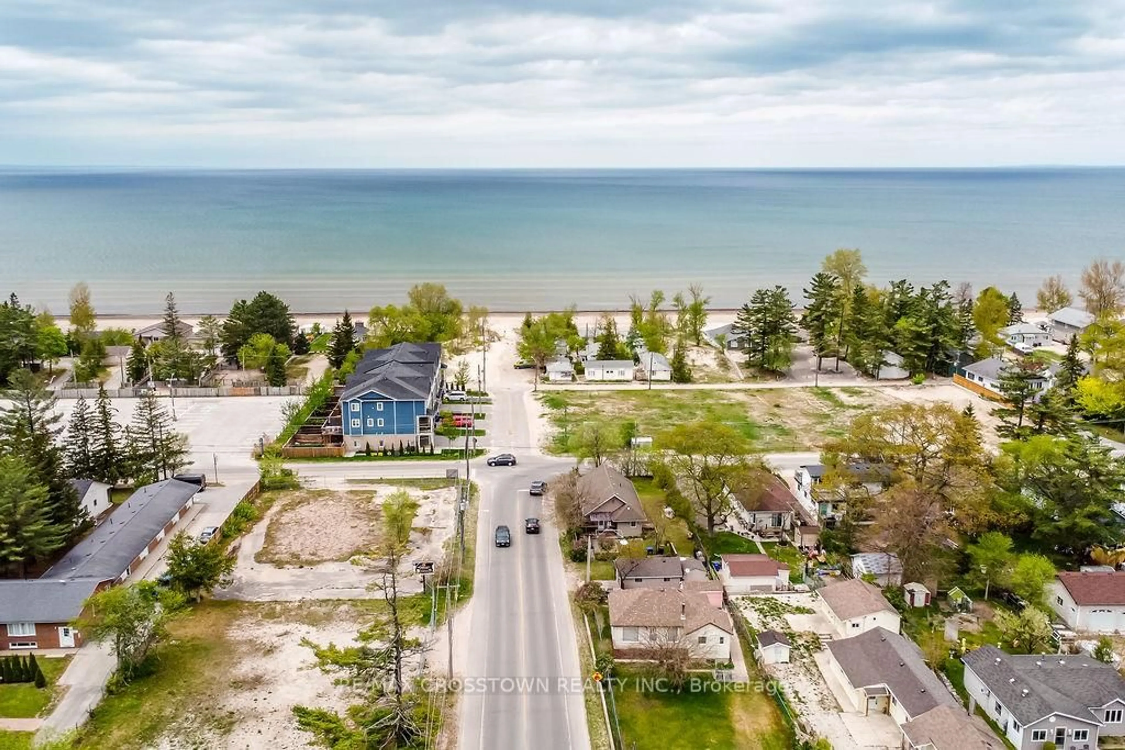 A pic from outside/outdoor area/front of a property/back of a property/a pic from drone, water/lake/river/ocean view for 799 Mosley St, Wasaga Beach Ontario L9Z 2H5