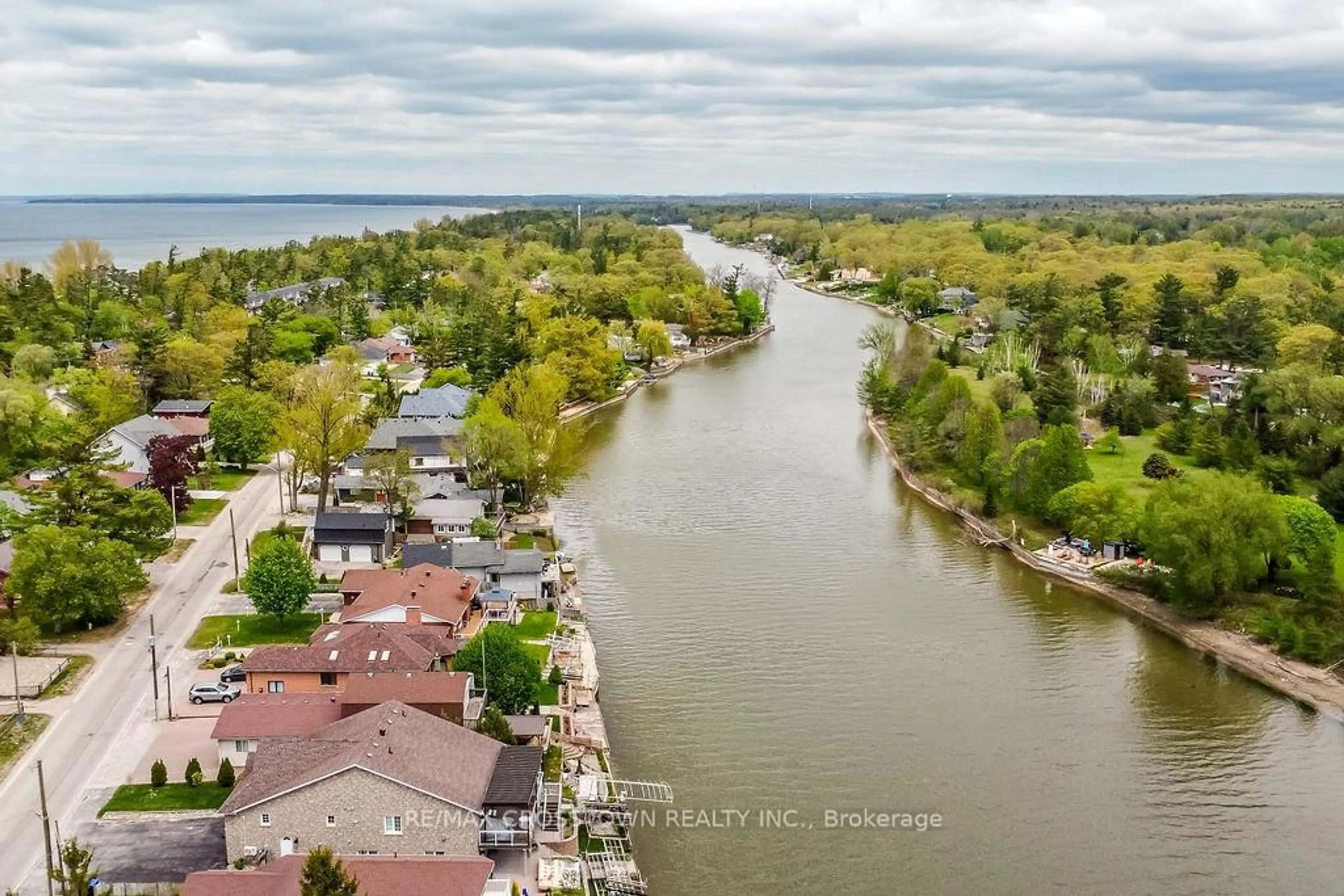A pic from outside/outdoor area/front of a property/back of a property/a pic from drone, water/lake/river/ocean view for 799 Mosley St, Wasaga Beach Ontario L9Z 2H5