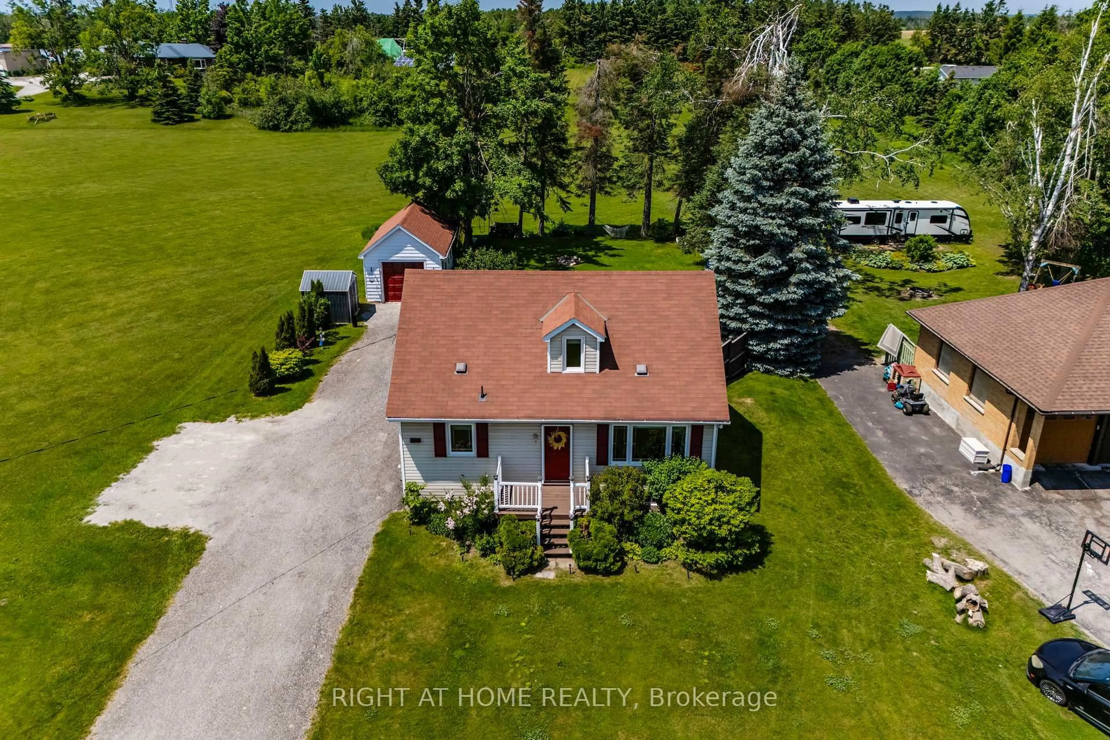 A pic from outside/outdoor area/front of a property/back of a property/a pic from drone, unknown for 2290 Highway 11 South Highway, Oro-Medonte Ontario L0L 2L0