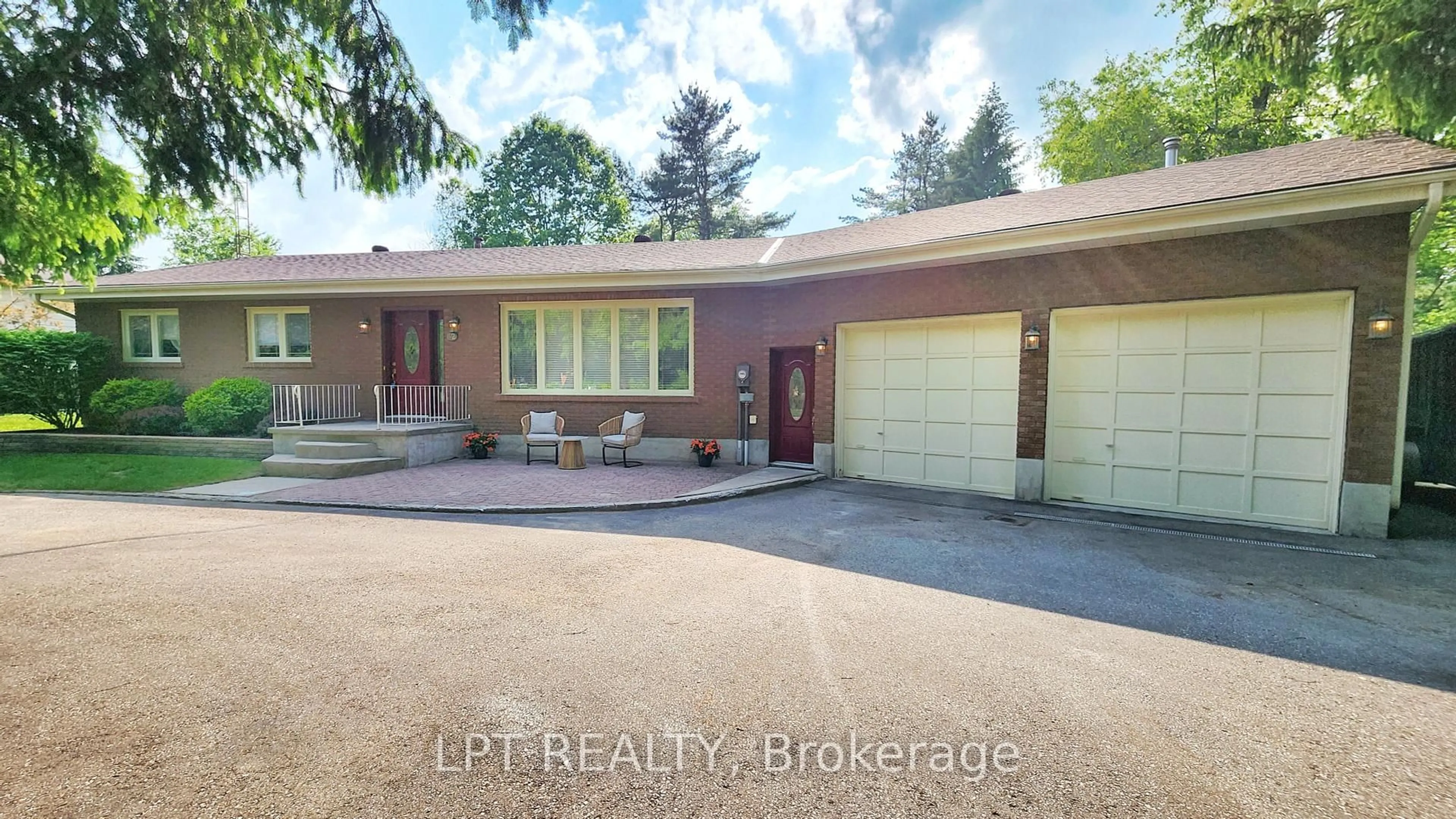 Home with brick exterior material, street for 32 Luella Blvd, Springwater Ontario L9X 0W8