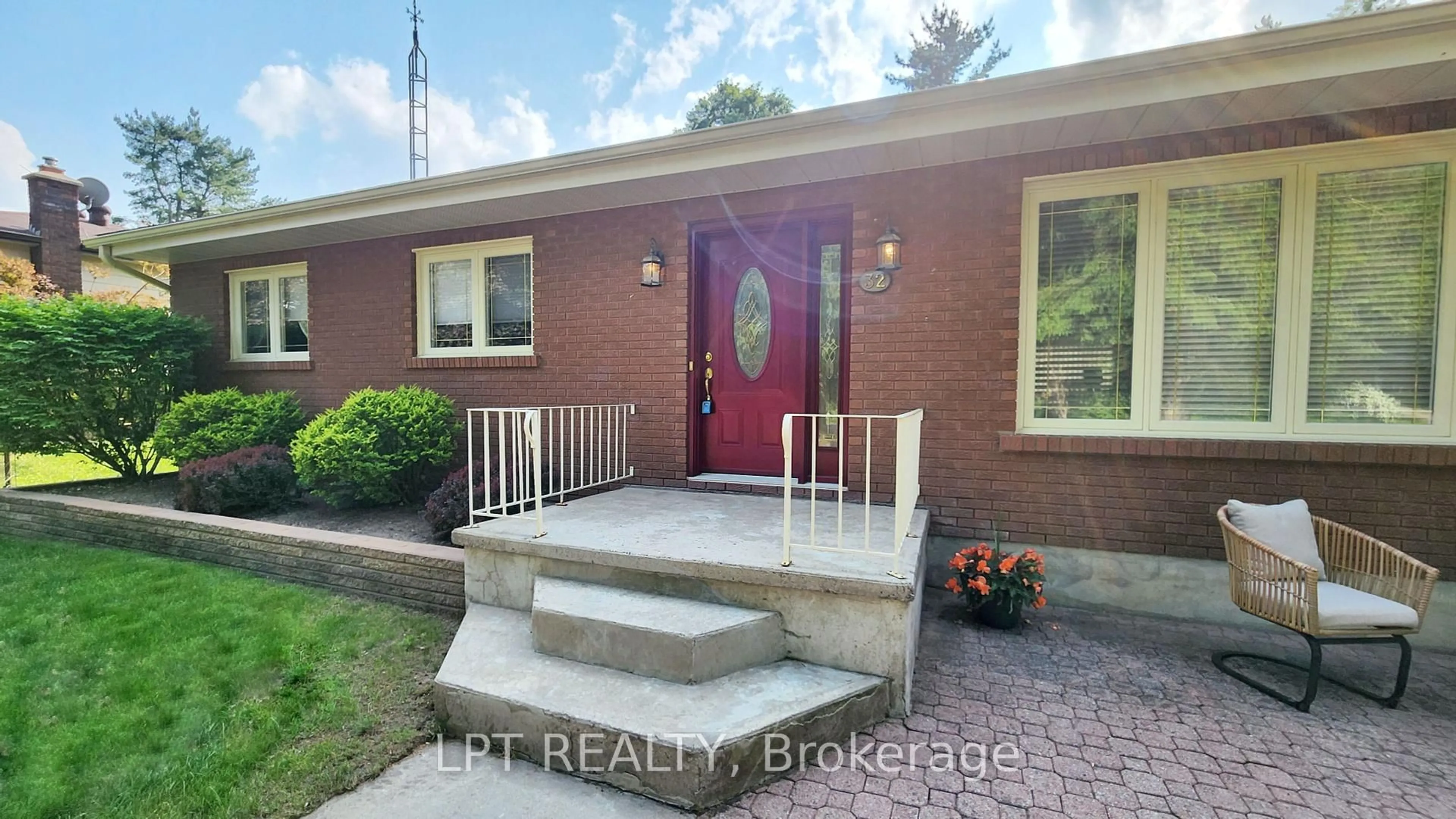Home with brick exterior material, street for 32 Luella Blvd, Springwater Ontario L9X 0W8