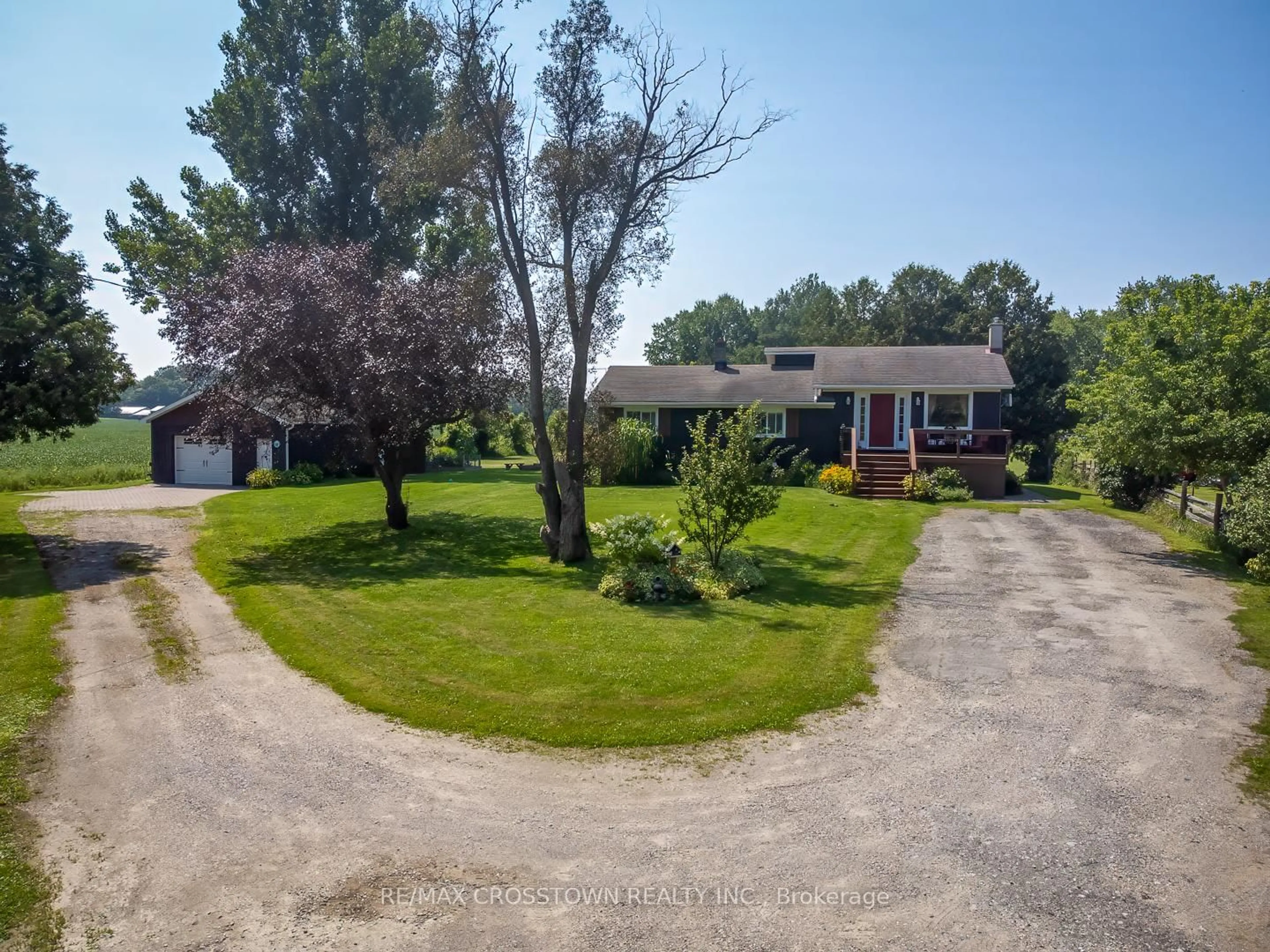 A pic from outside/outdoor area/front of a property/back of a property/a pic from drone, street for 14308 County 27 Rd, Springwater Ontario L0L 1P0