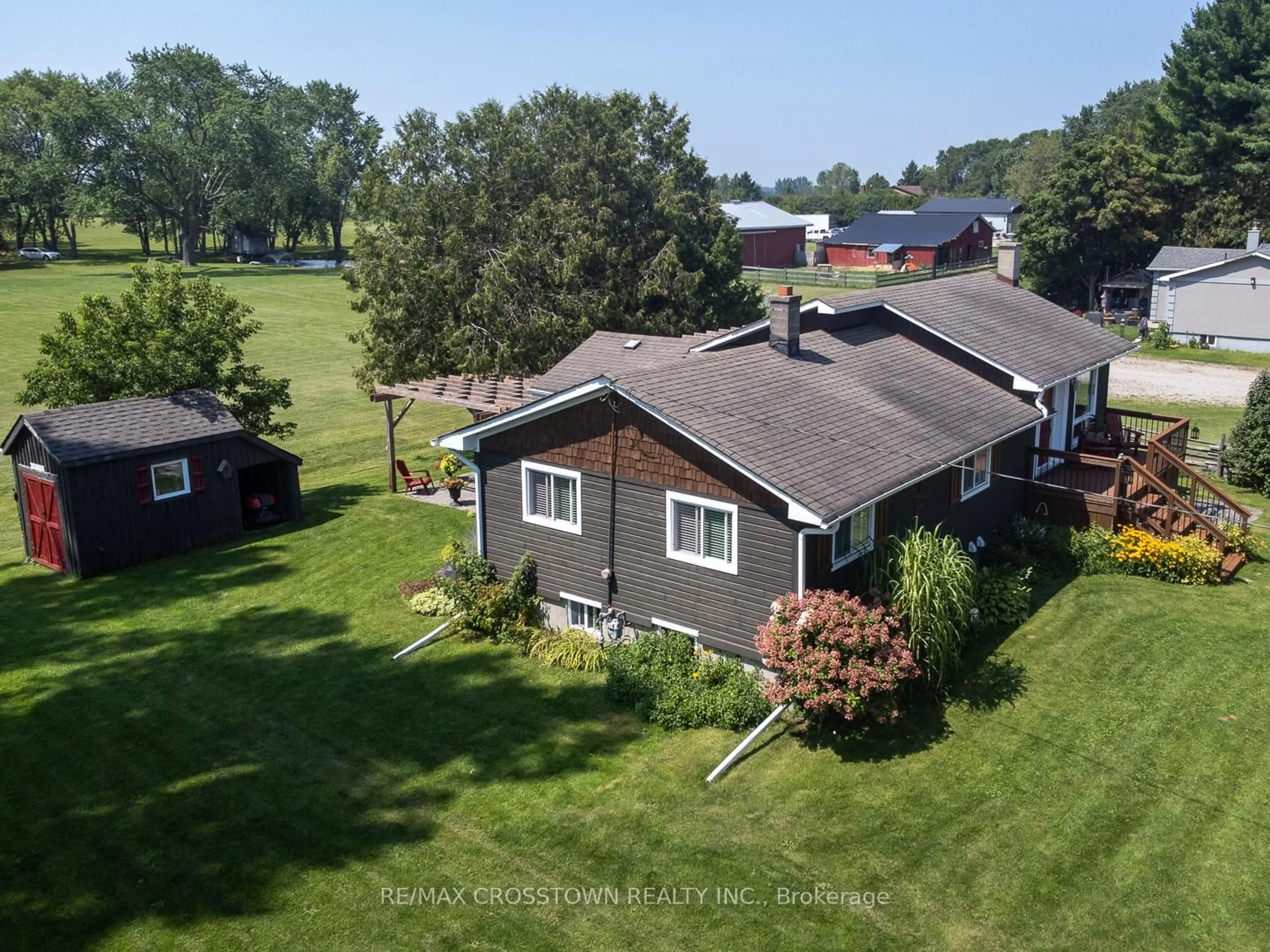 A pic from outside/outdoor area/front of a property/back of a property/a pic from drone, unknown for 14308 County 27 Rd, Springwater Ontario L0L 1P0