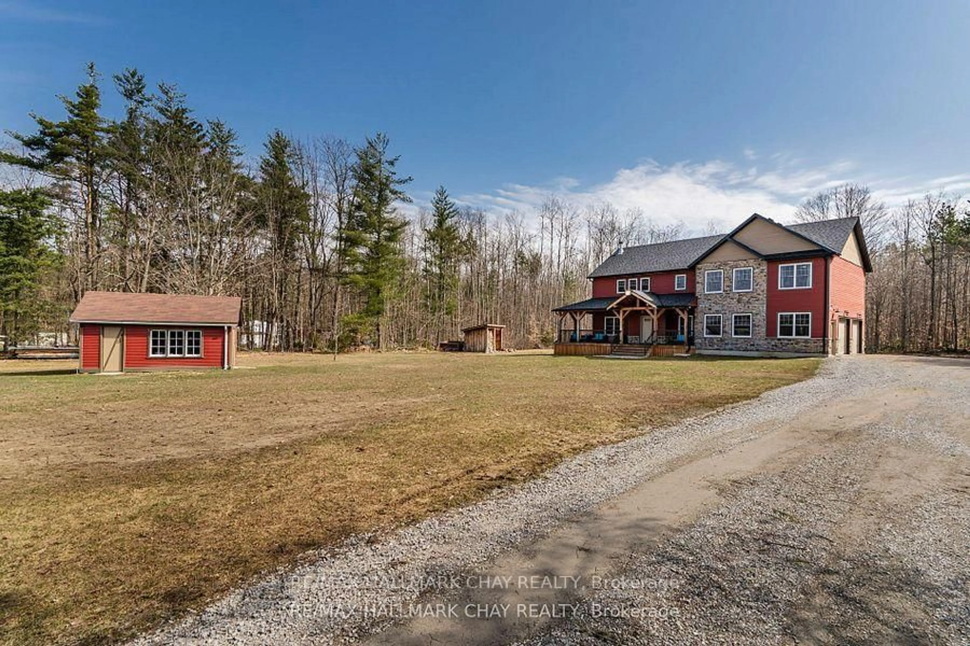 A pic from outside/outdoor area/front of a property/back of a property/a pic from drone, mountain view for 2091 Dwyer Rd, Springwater Ontario L9X 1L7