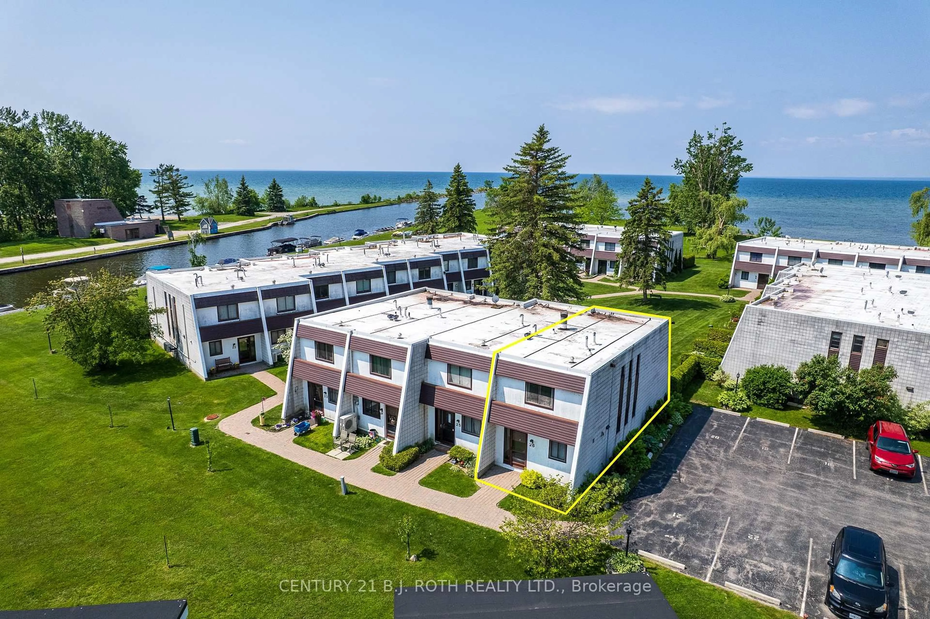 A pic from outside/outdoor area/front of a property/back of a property/a pic from drone, water/lake/river/ocean view for 1 Paradise Blvd #26, Ramara Ontario L0K 1B0