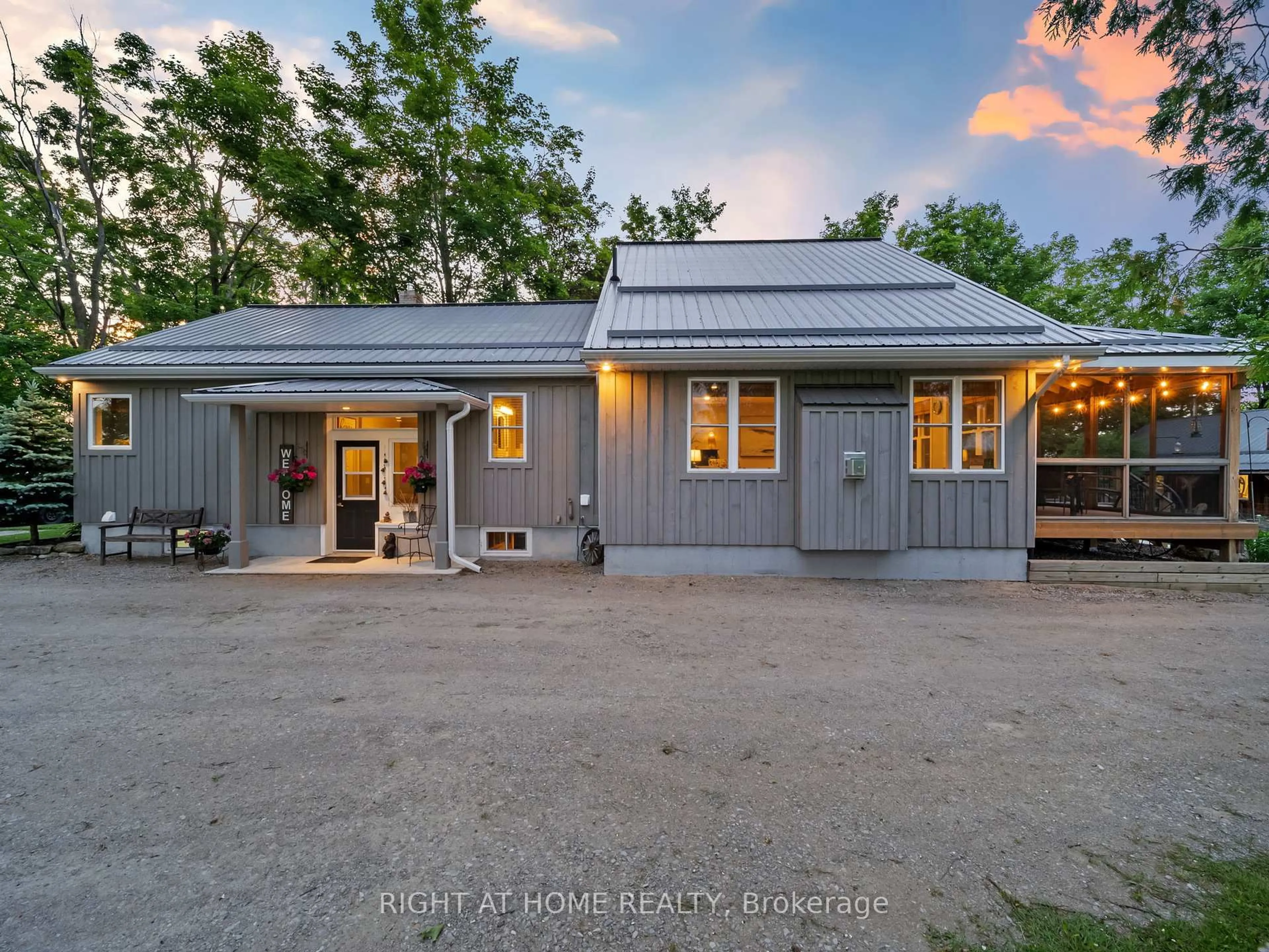 A pic from outside/outdoor area/front of a property/back of a property/a pic from drone, street for 1947 Russell Rd, Springwater Ontario L9X 1R5