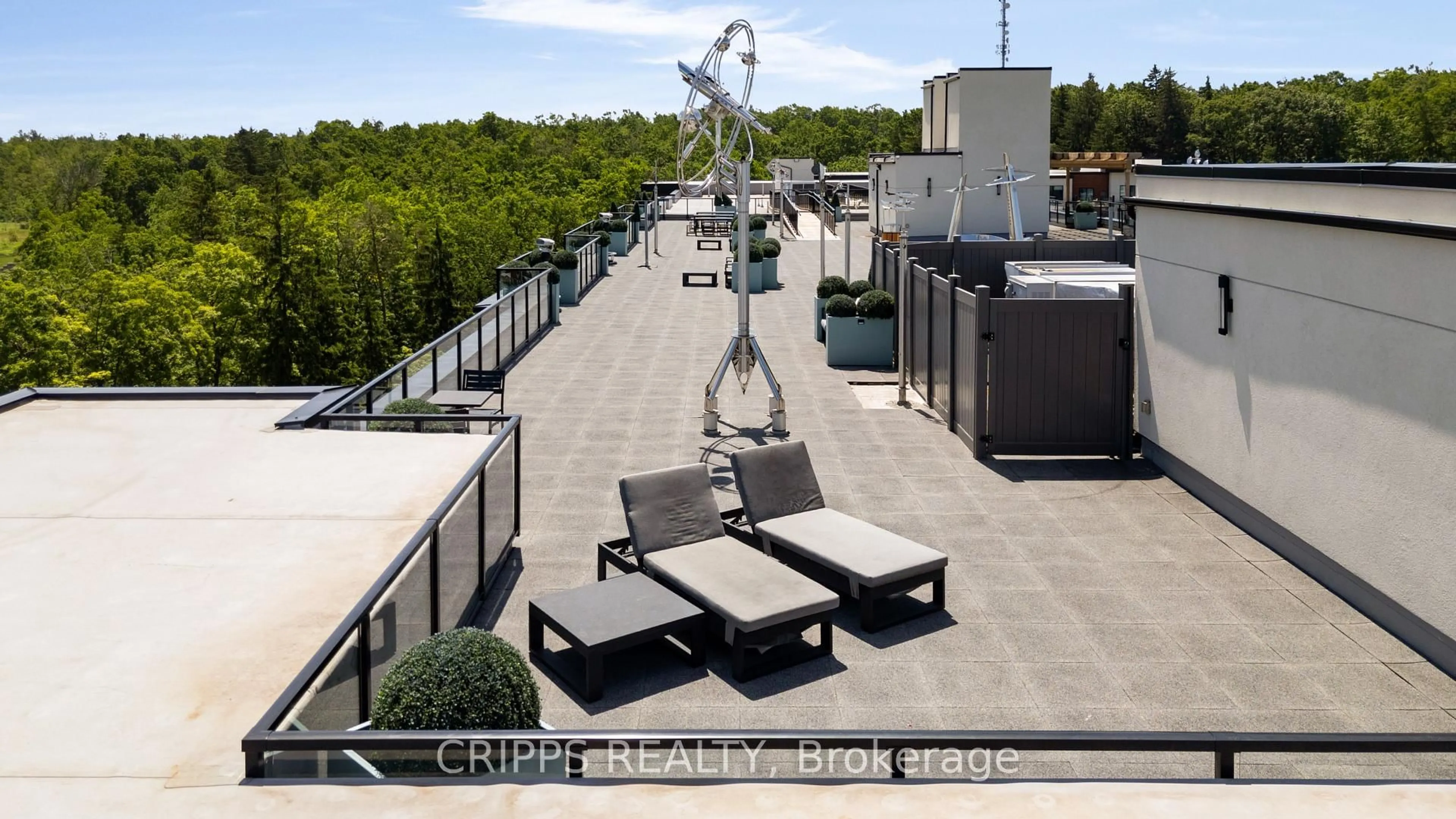 Patio, city buildings view from balcony for 306 Essa Rd #112, Barrie Ontario L9J 0H5