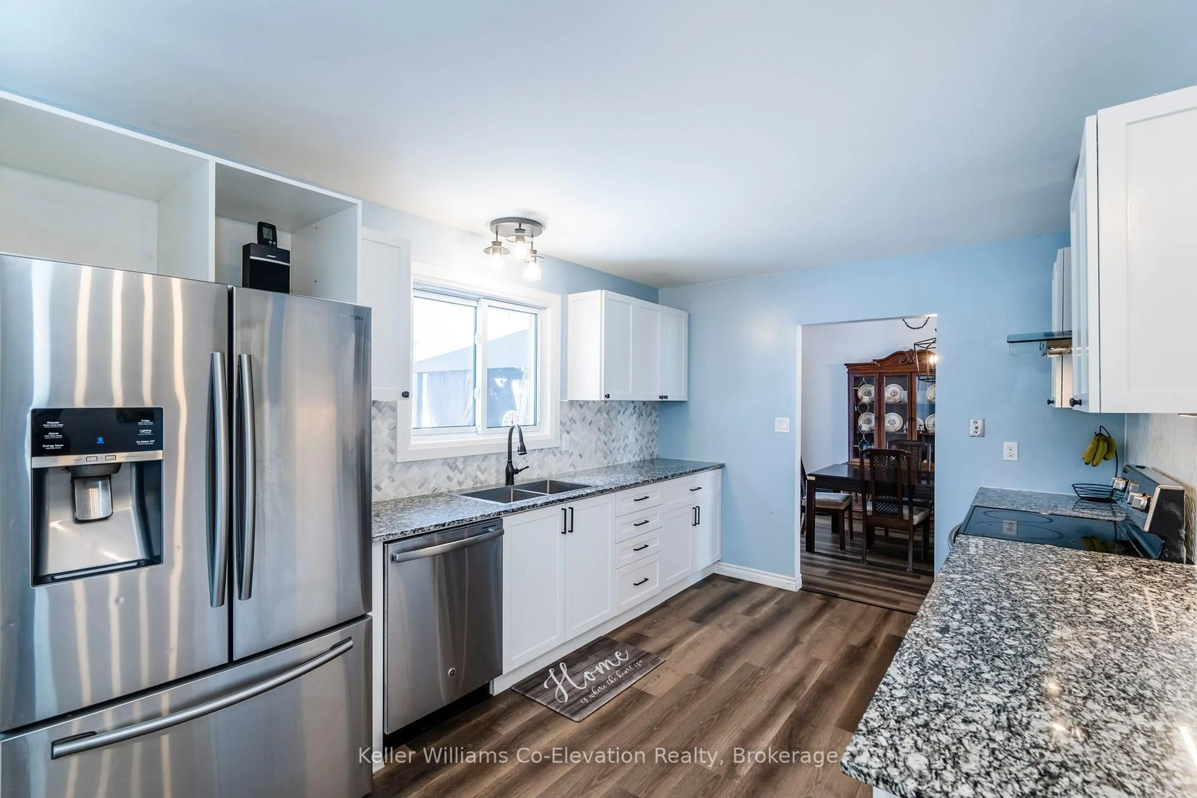 Open concept kitchen, ceramic/tile floor for 169 Switzer St, Clearview Ontario L0M 1N0