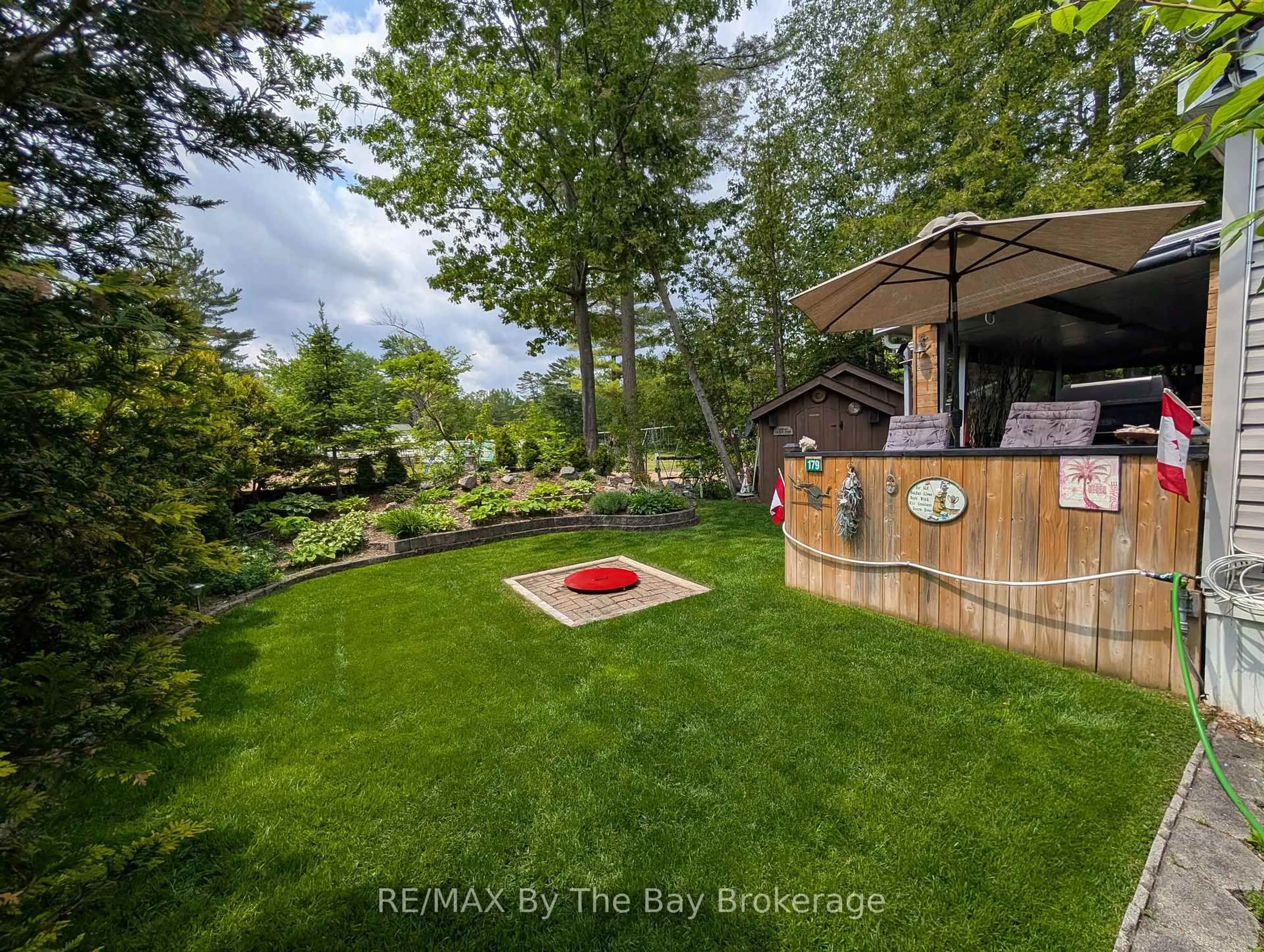 Patio, forest/trees view for 85 Theme Park Dr #179, Wasaga Beach Ontario L9Z 1X7