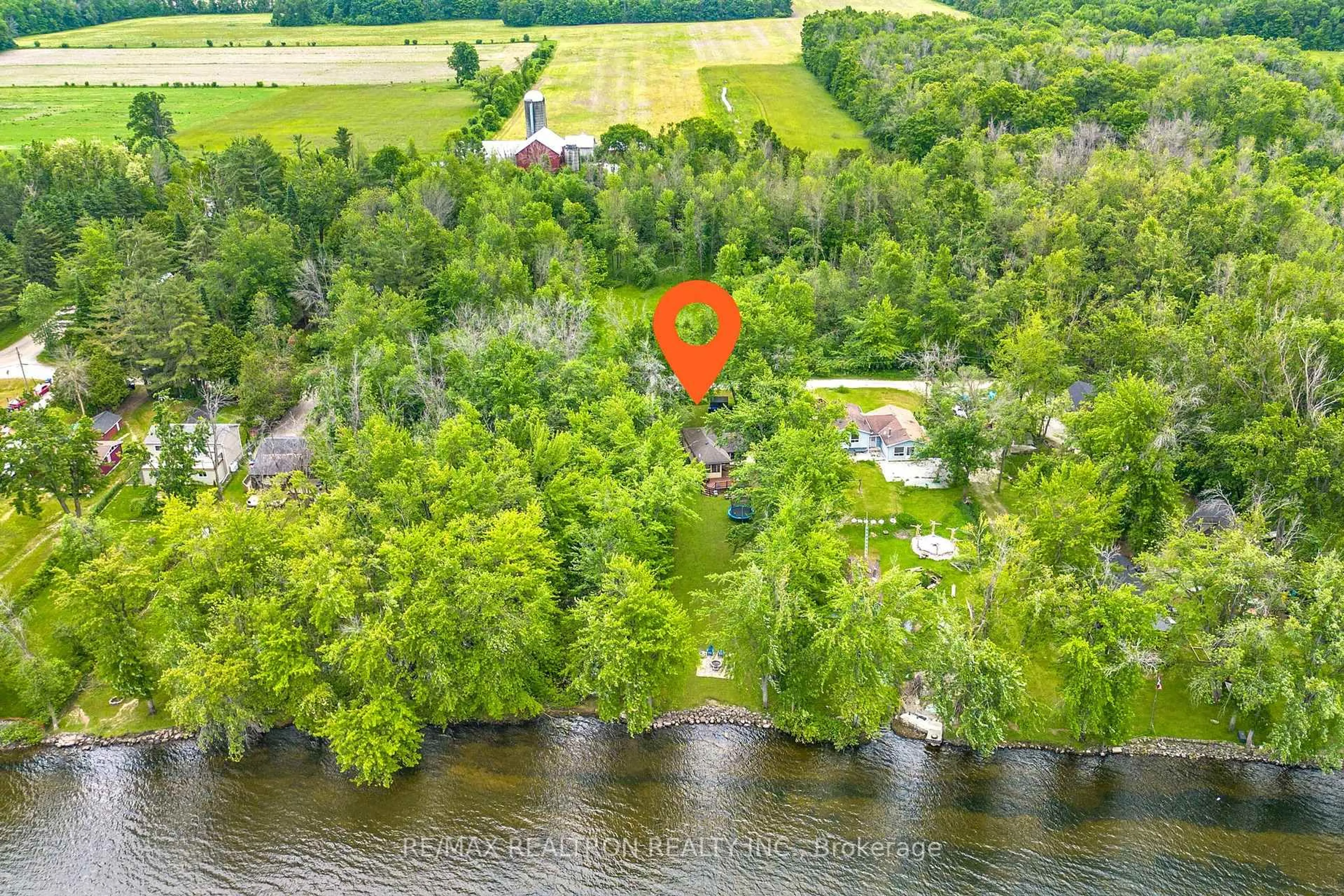 A pic from outside/outdoor area/front of a property/back of a property/a pic from drone, water/lake/river/ocean view for 6090 Sheba Dr, Ramara Ontario L3V 6H3