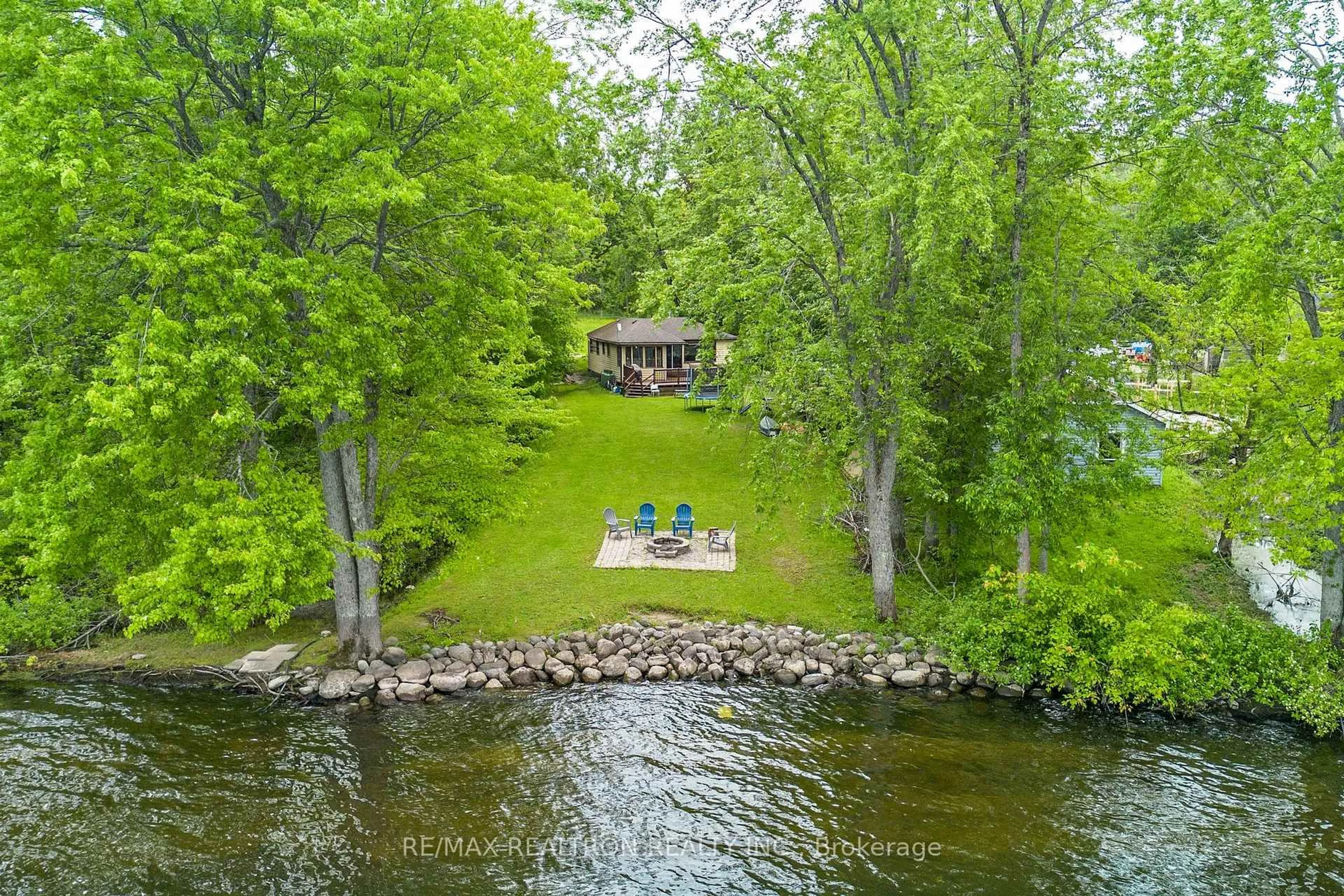 A pic from outside/outdoor area/front of a property/back of a property/a pic from drone, water/lake/river/ocean view for 6090 Sheba Dr, Ramara Ontario L3V 6H3
