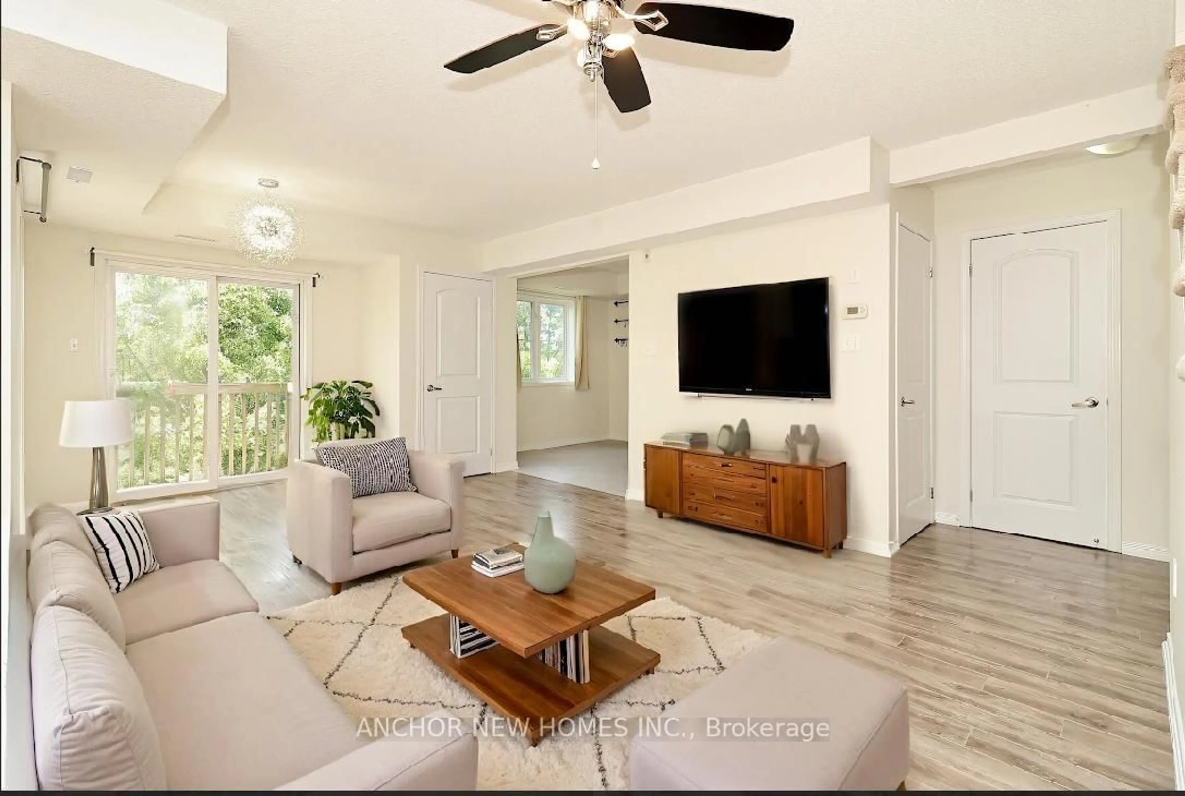 Living room with furniture, unknown for 19 Cheltenham Rd #7, Barrie Ontario L4M 0E7