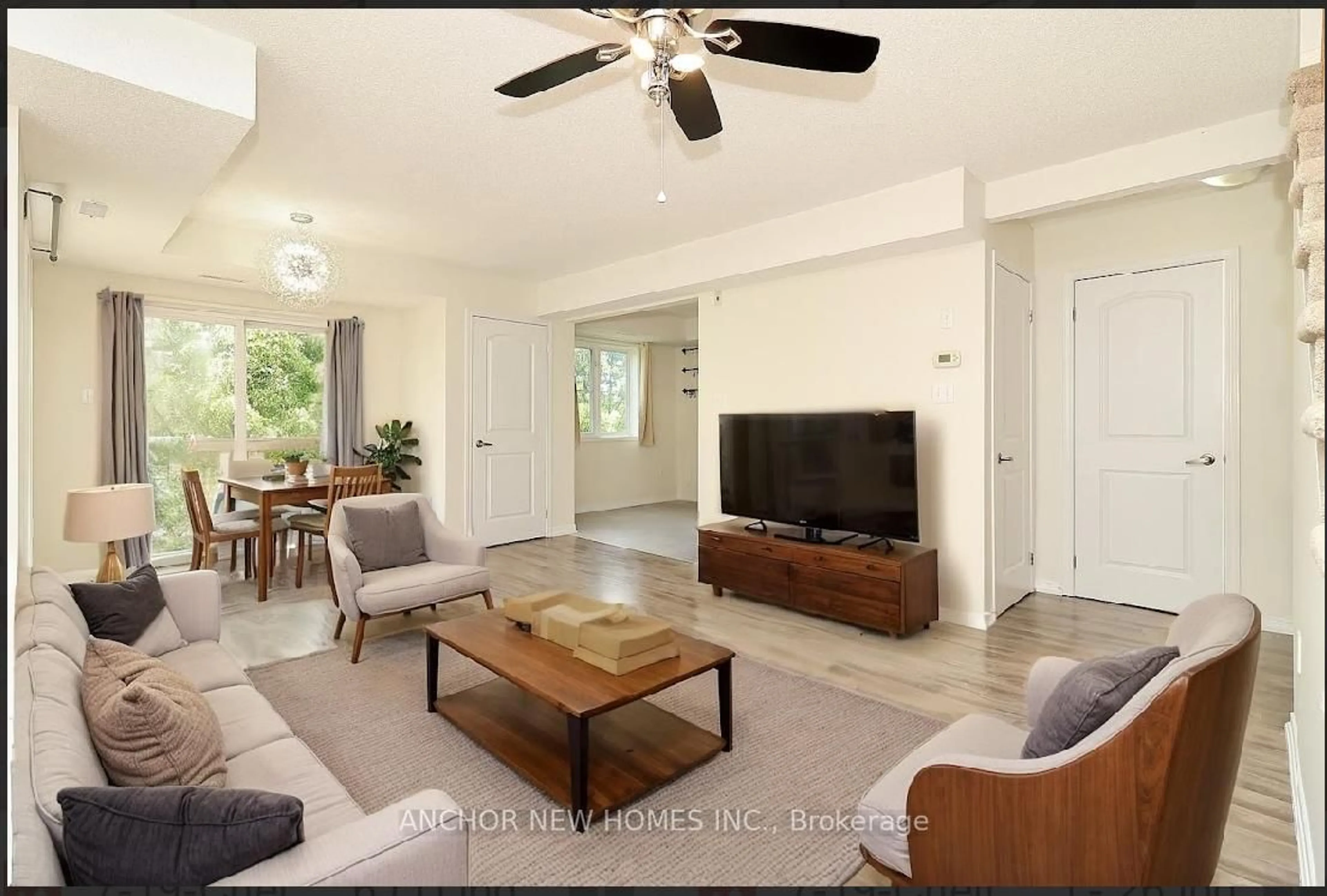 Living room with furniture, unknown for 19 Cheltenham Rd #7, Barrie Ontario L4M 0E7
