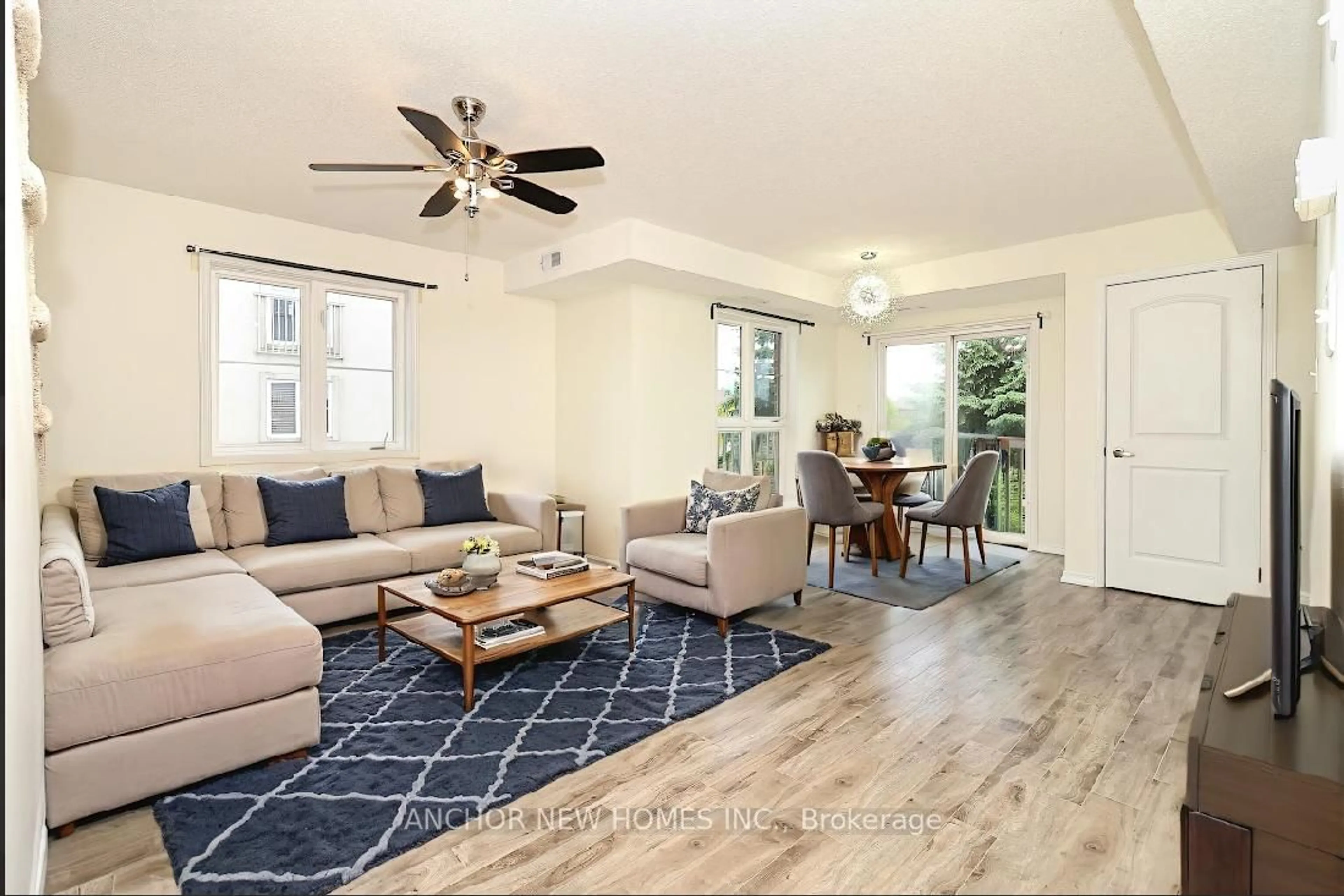 Living room with furniture, unknown for 19 Cheltenham Rd #7, Barrie Ontario L4M 0E7