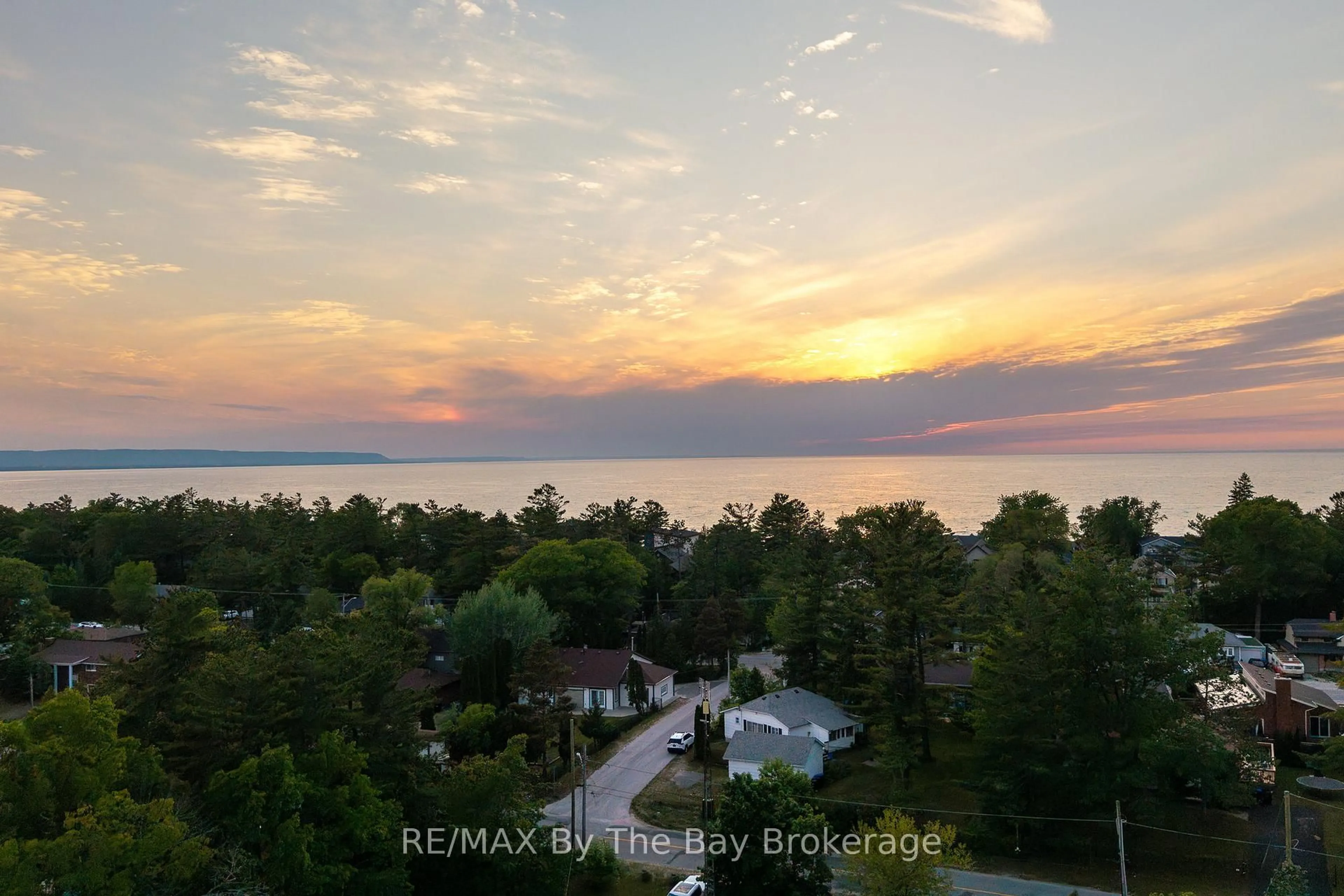 A pic from outside/outdoor area/front of a property/back of a property/a pic from drone, water/lake/river/ocean view for 83 OLD MOSLEY St, Wasaga Beach Ontario L9Z 2J5