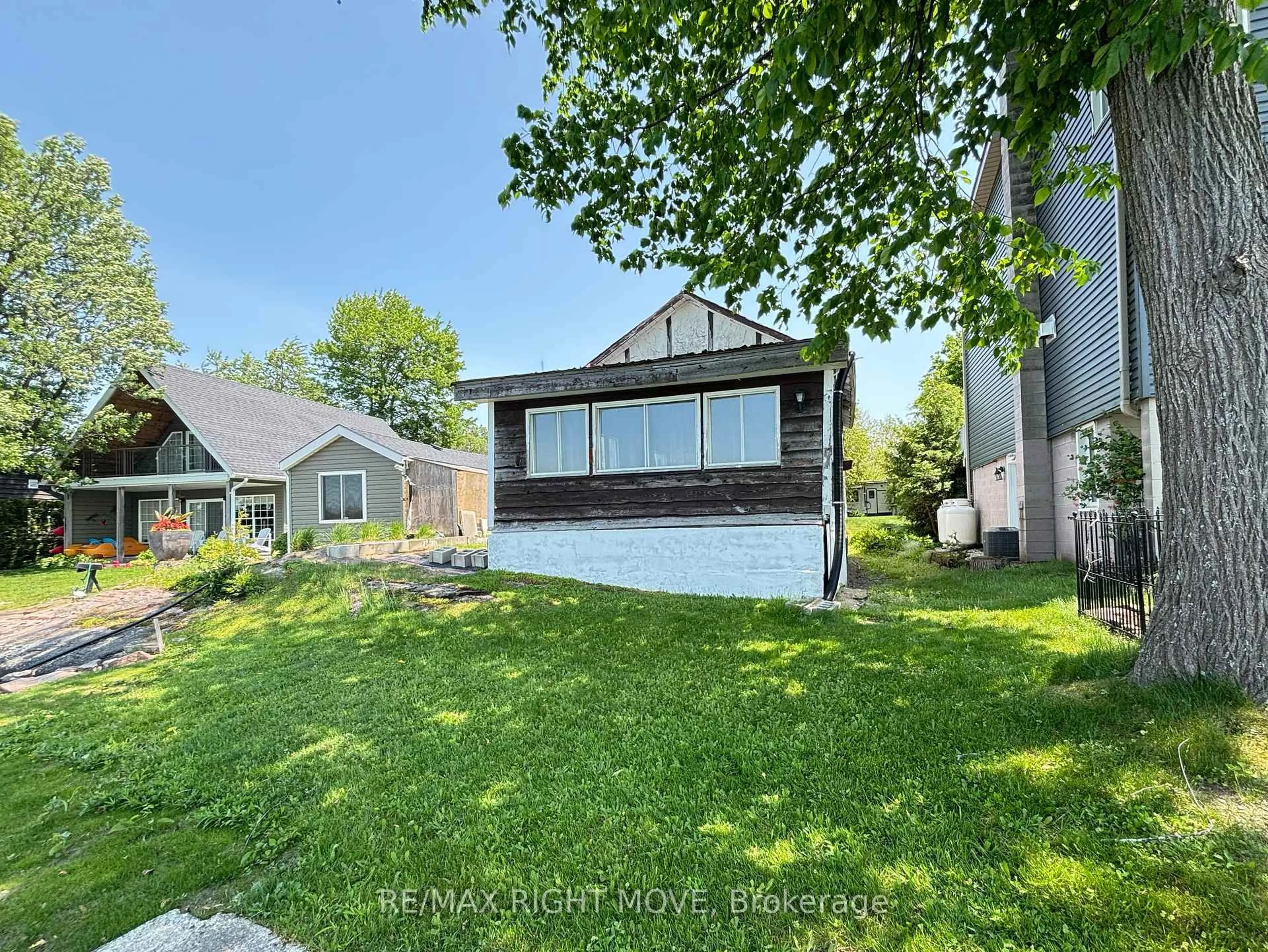 A pic from outside/outdoor area/front of a property/back of a property/a pic from drone, water/lake/river/ocean view for 7682 Oak Point Rd, Ramara Ontario L0K 2B0