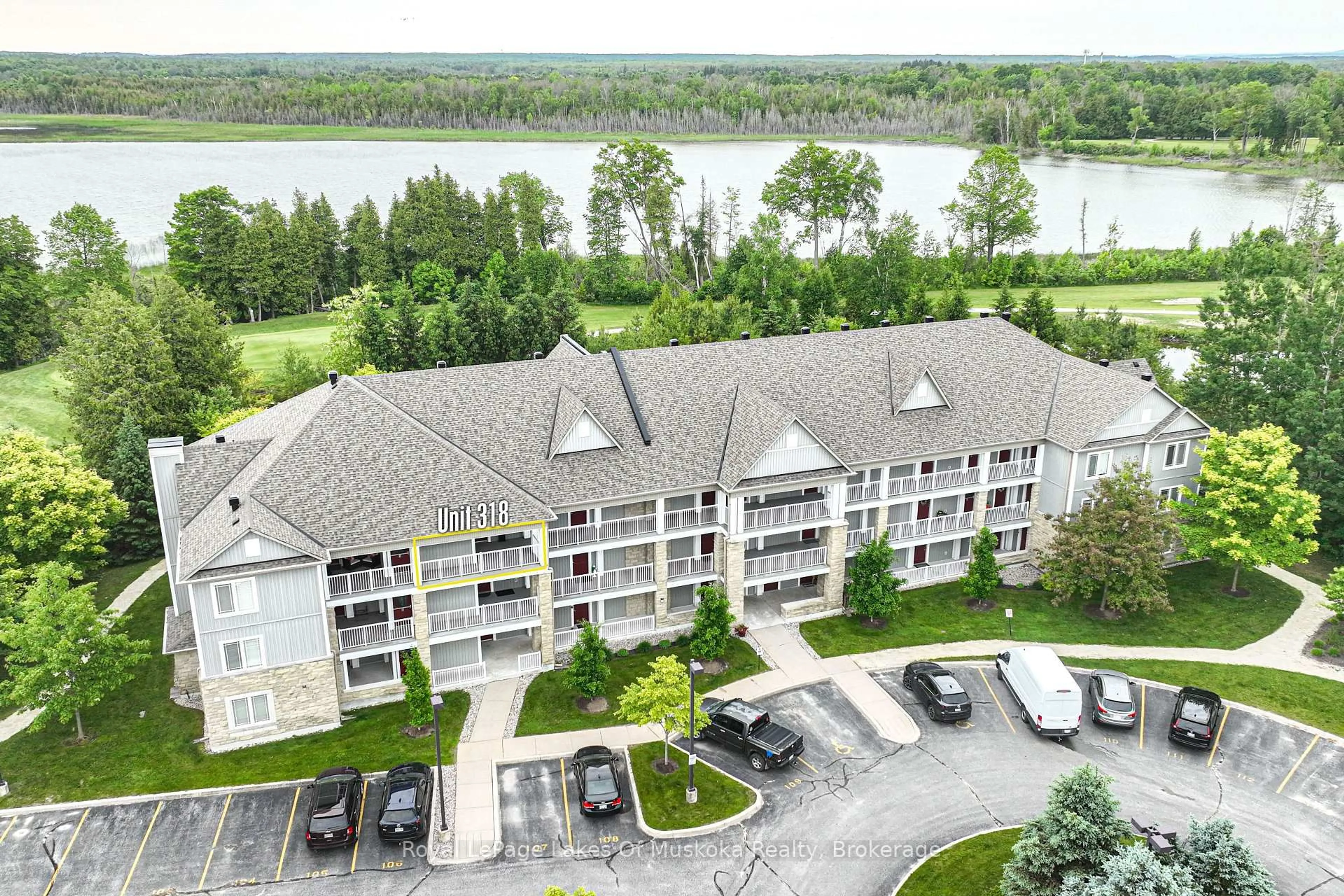 A pic from outside/outdoor area/front of a property/back of a property/a pic from drone, water/lake/river/ocean view for 60 Mulligan Lane #318, Wasaga Beach Ontario L9Z 0C5