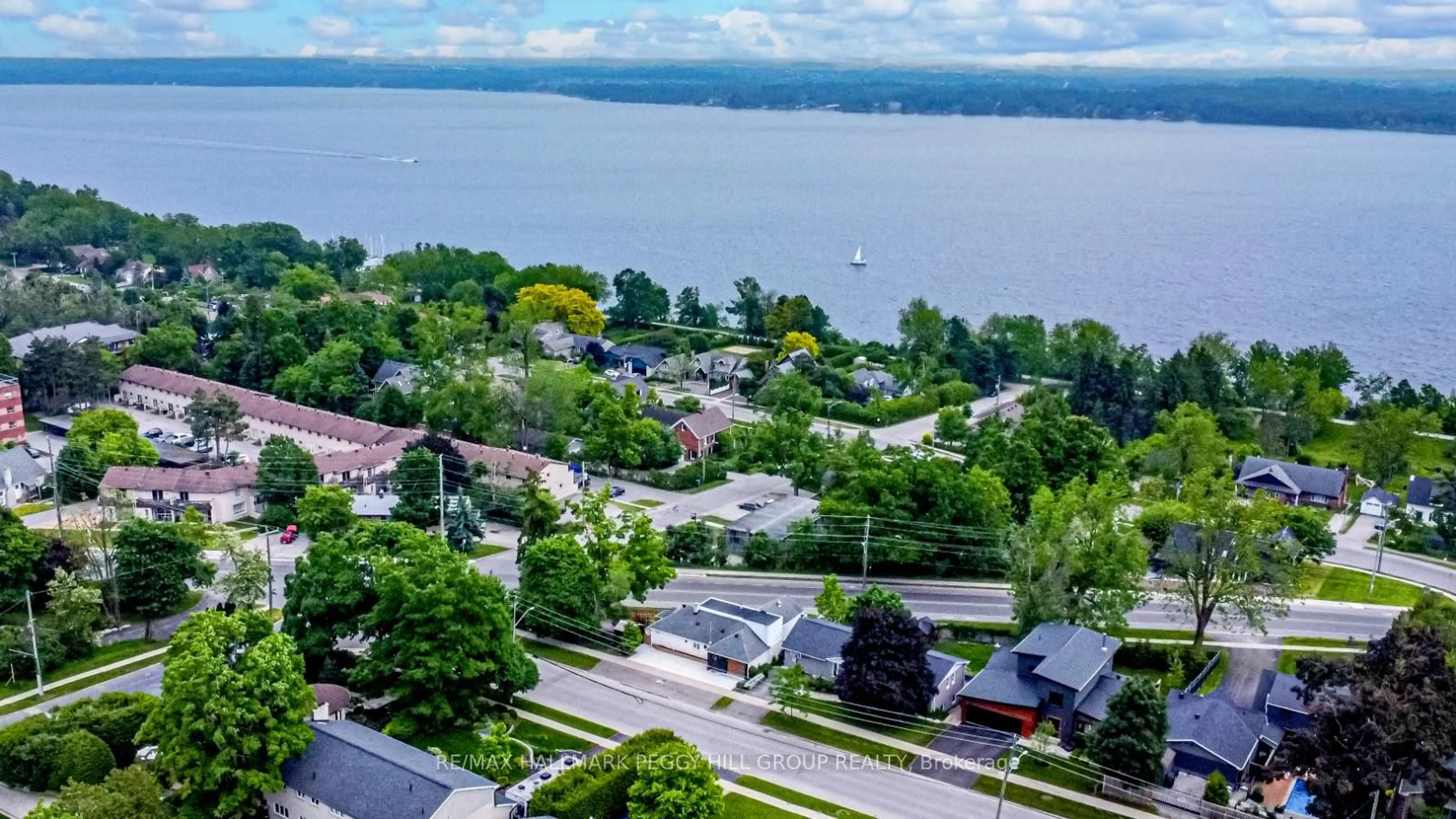 A pic from outside/outdoor area/front of a property/back of a property/a pic from drone, water/lake/river/ocean view for 425 Codrington St, Barrie Ontario L4M 1S9