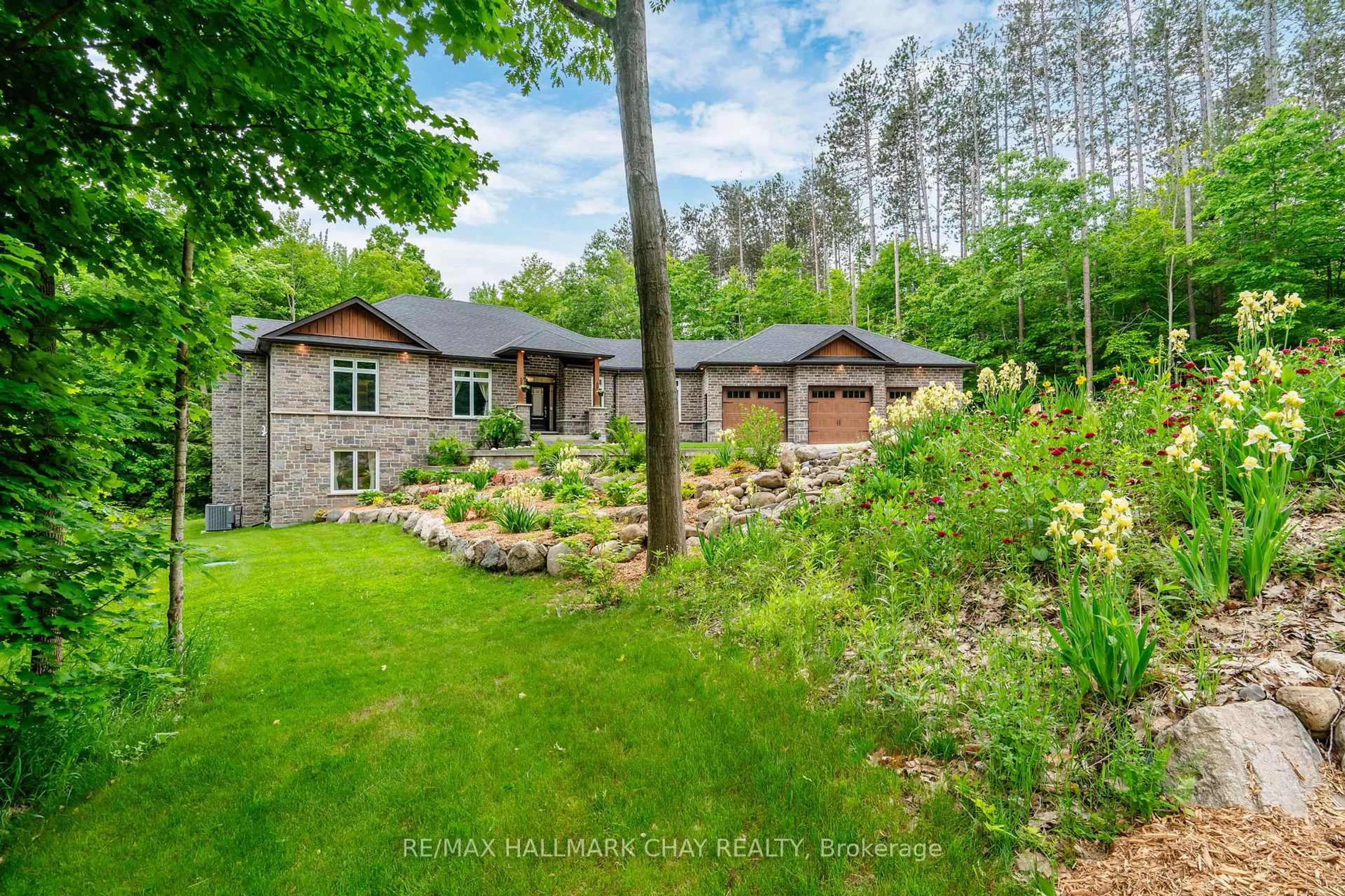 A pic from outside/outdoor area/front of a property/back of a property/a pic from drone, forest/trees view for 2 Timberland Crt, Tiny Ontario L9M 0M3