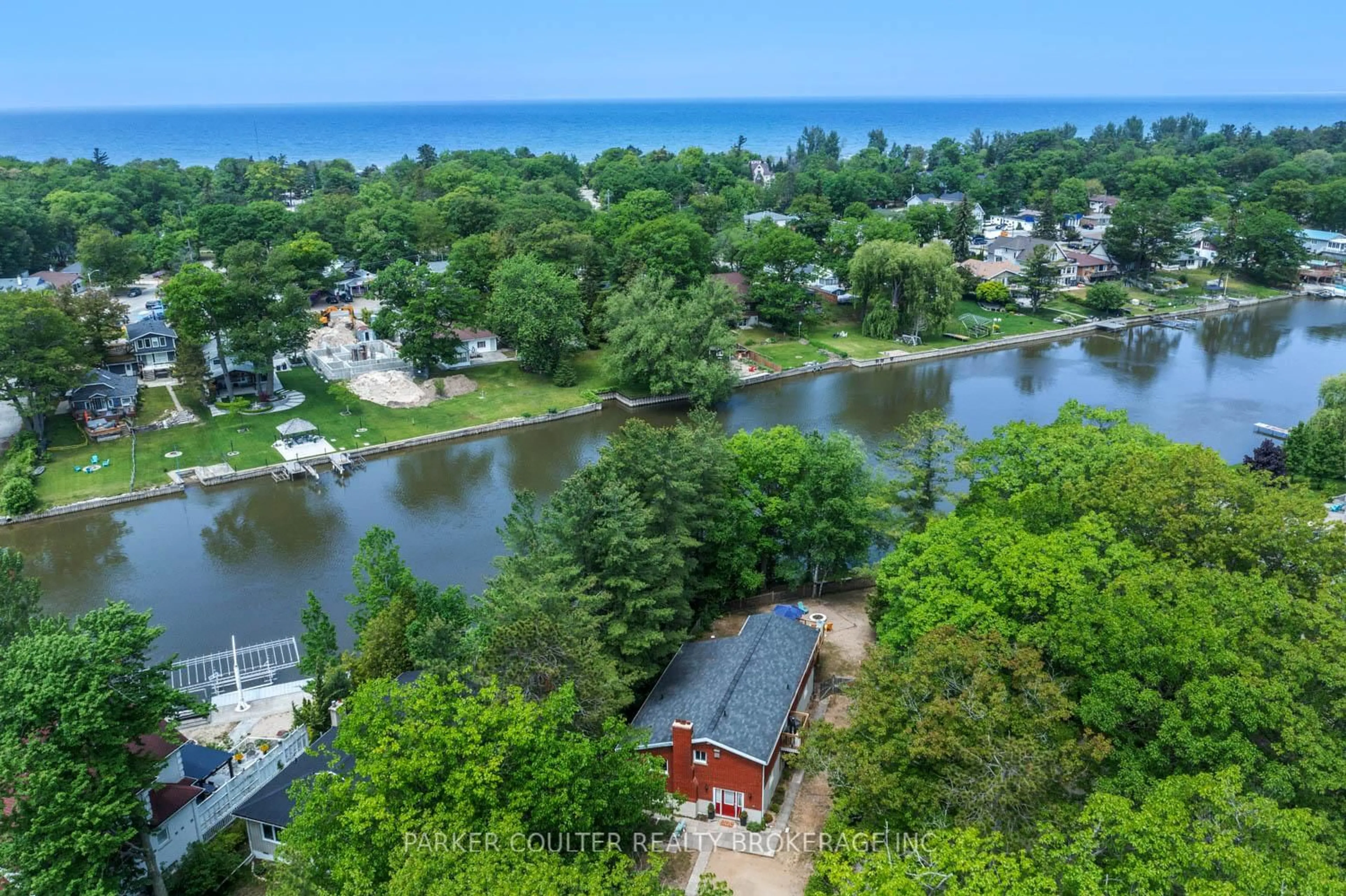 A pic from outside/outdoor area/front of a property/back of a property/a pic from drone, water/lake/river/ocean view for 1944 River Rd, Wasaga Beach Ontario L9Z 2W2