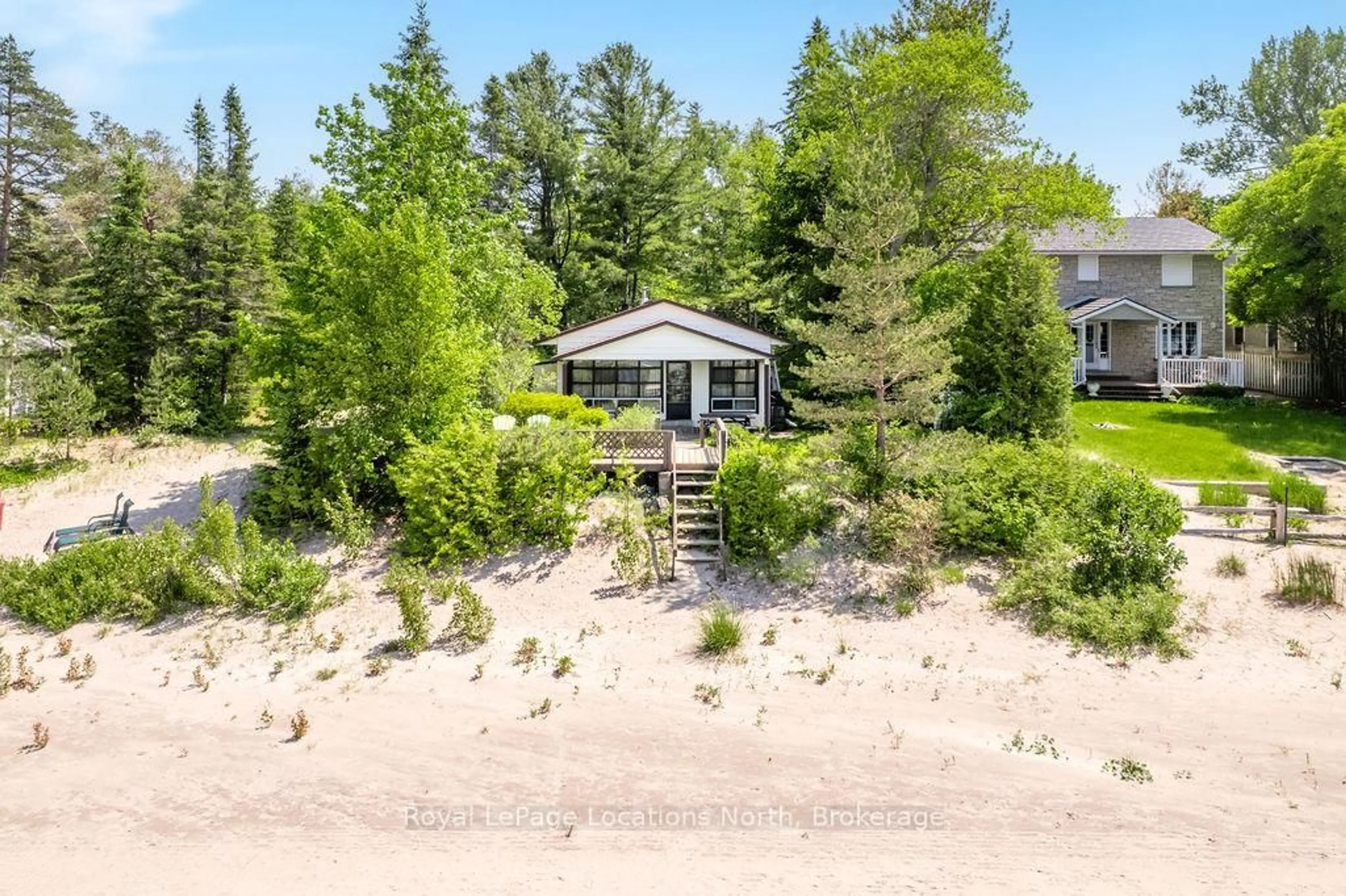 A pic from outside/outdoor area/front of a property/back of a property/a pic from drone, water/lake/river/ocean view for 1864 Shore Lane, Wasaga Beach Ontario L9Z 1V2