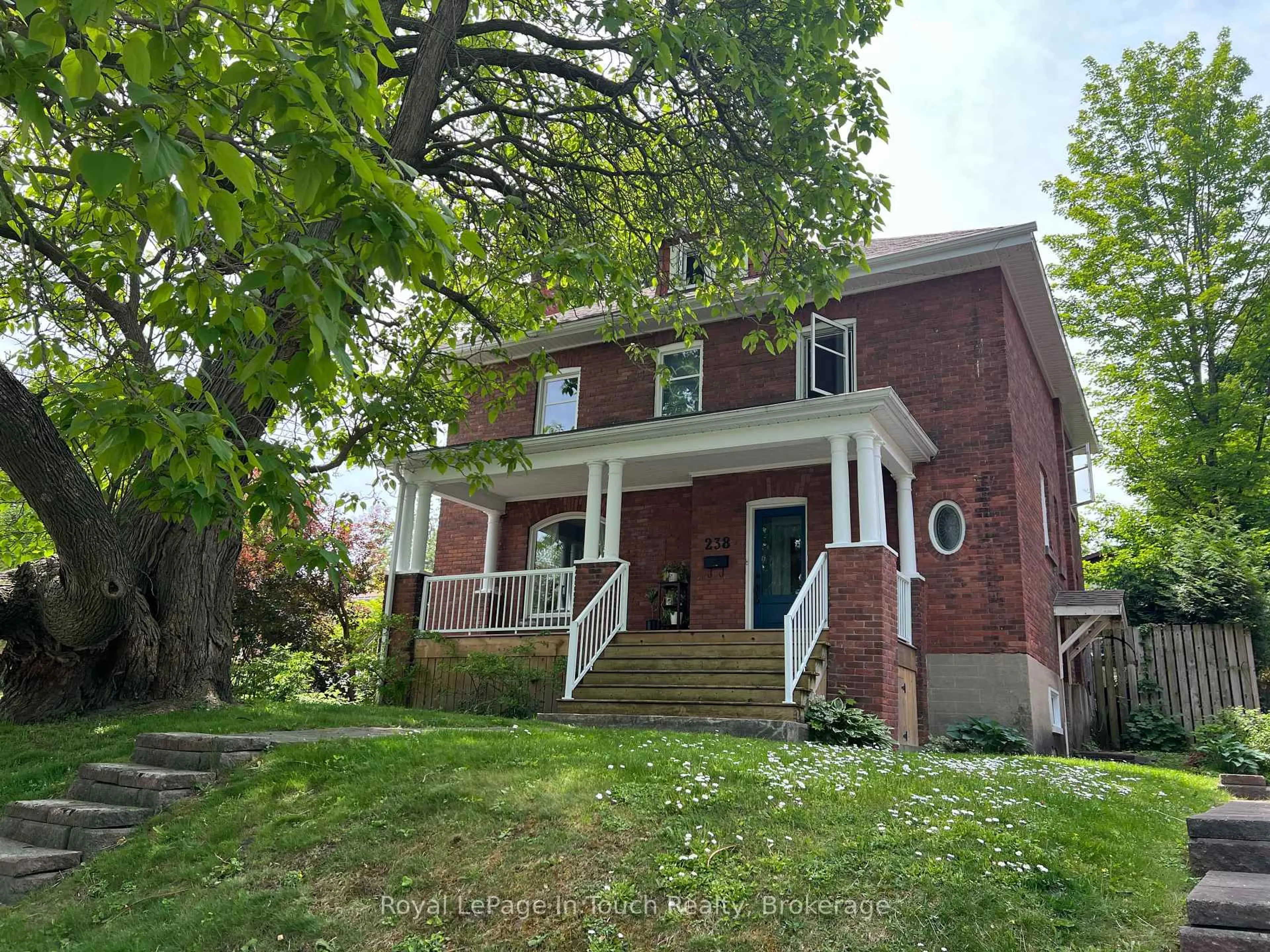 Home with brick exterior material, street for 238 Sixth St, Midland Ontario L4R 3Y1