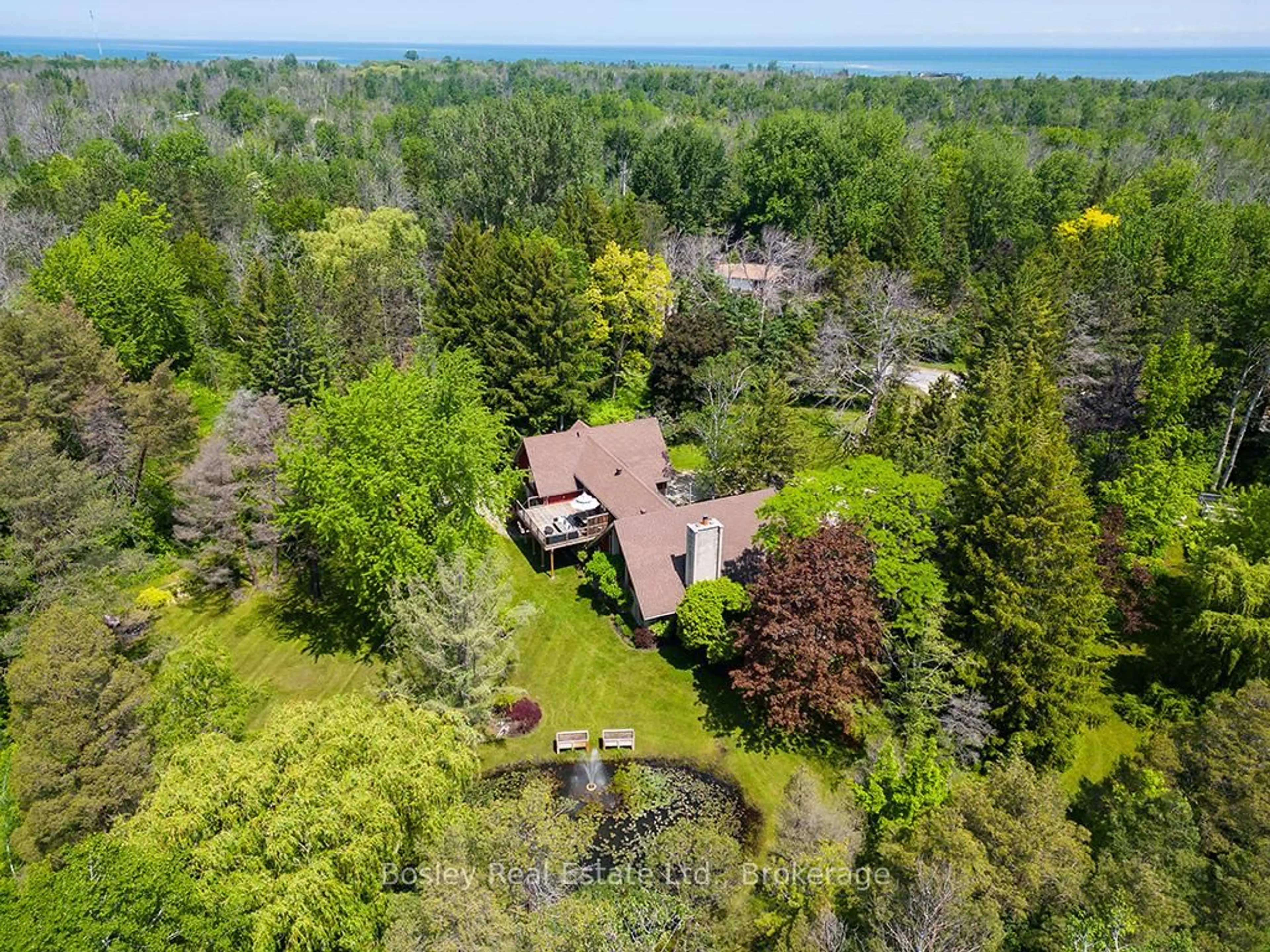 A pic from outside/outdoor area/front of a property/back of a property/a pic from drone, water/lake/river/ocean view for 53 Silver Creek Dr, Collingwood Ontario L9Y 4W9