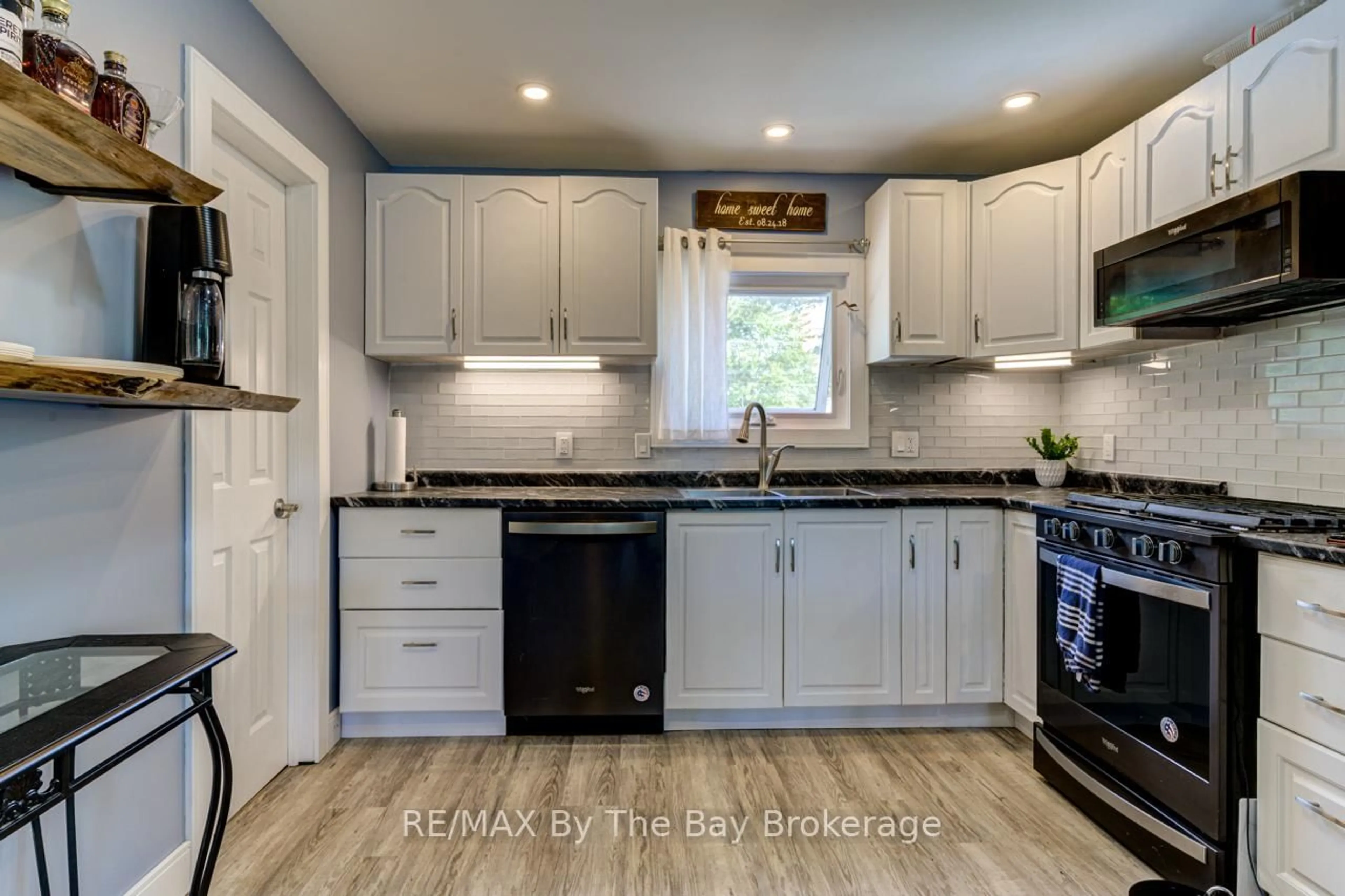 Open concept kitchen, ceramic/tile floor for 1250 River Rd, Wasaga Beach Ontario L9Z 2W6
