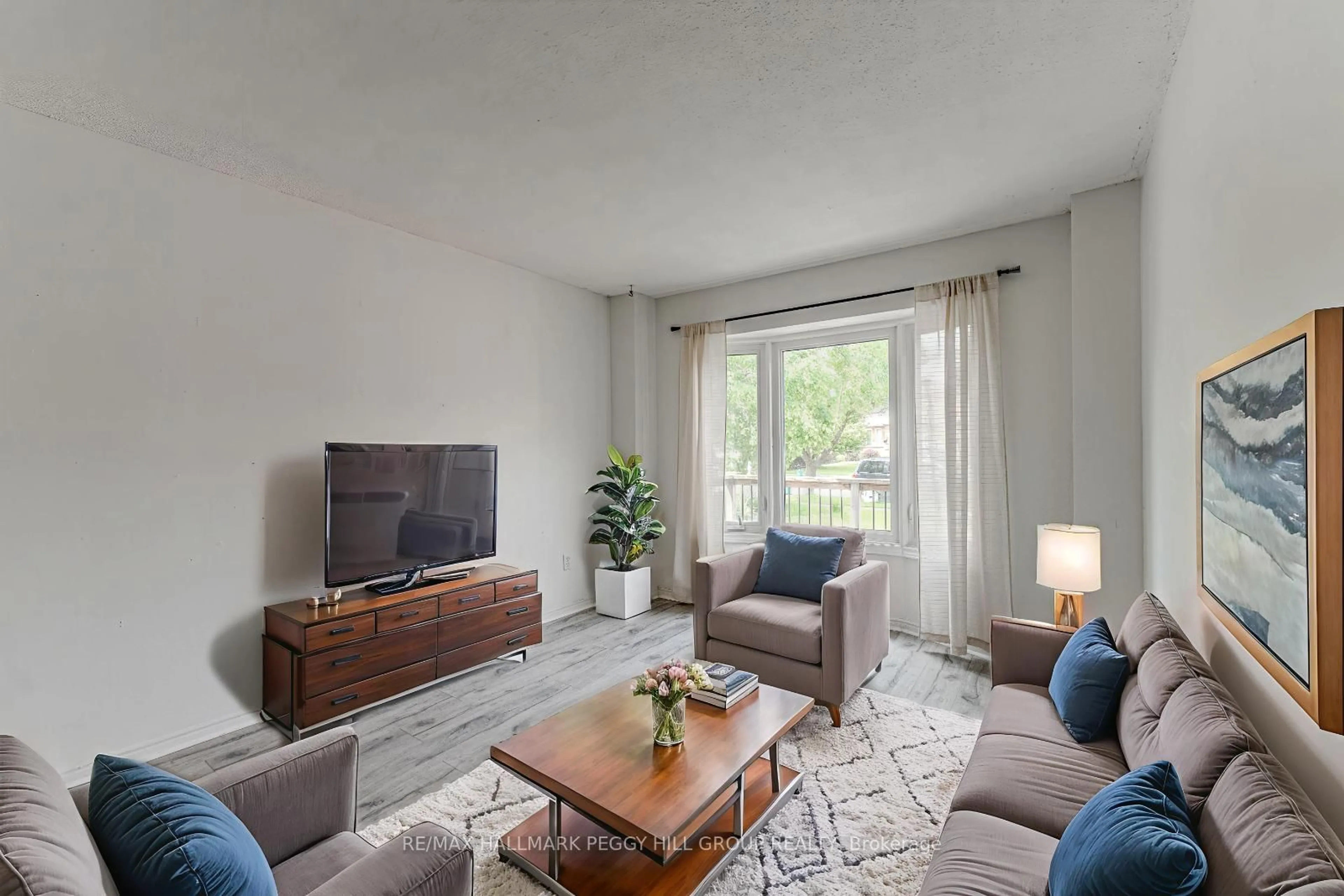 Living room with furniture, unknown for 256 Hickling Tr, Barrie Ontario L4M 5W7