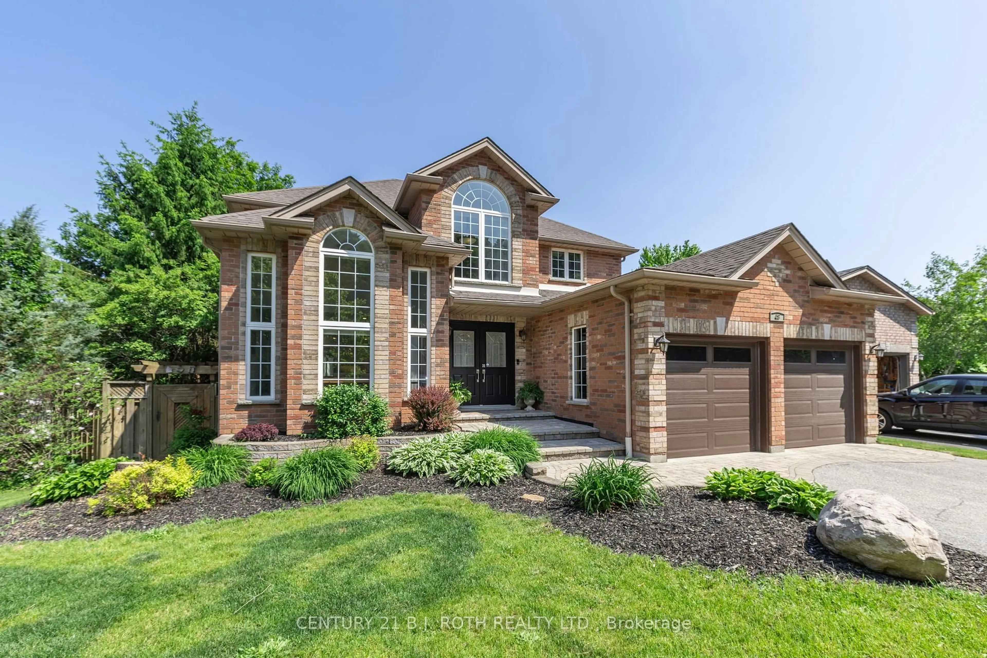 Home with brick exterior material, street for 48 Crimson Ridge Rd, Barrie Ontario L4N 9S1
