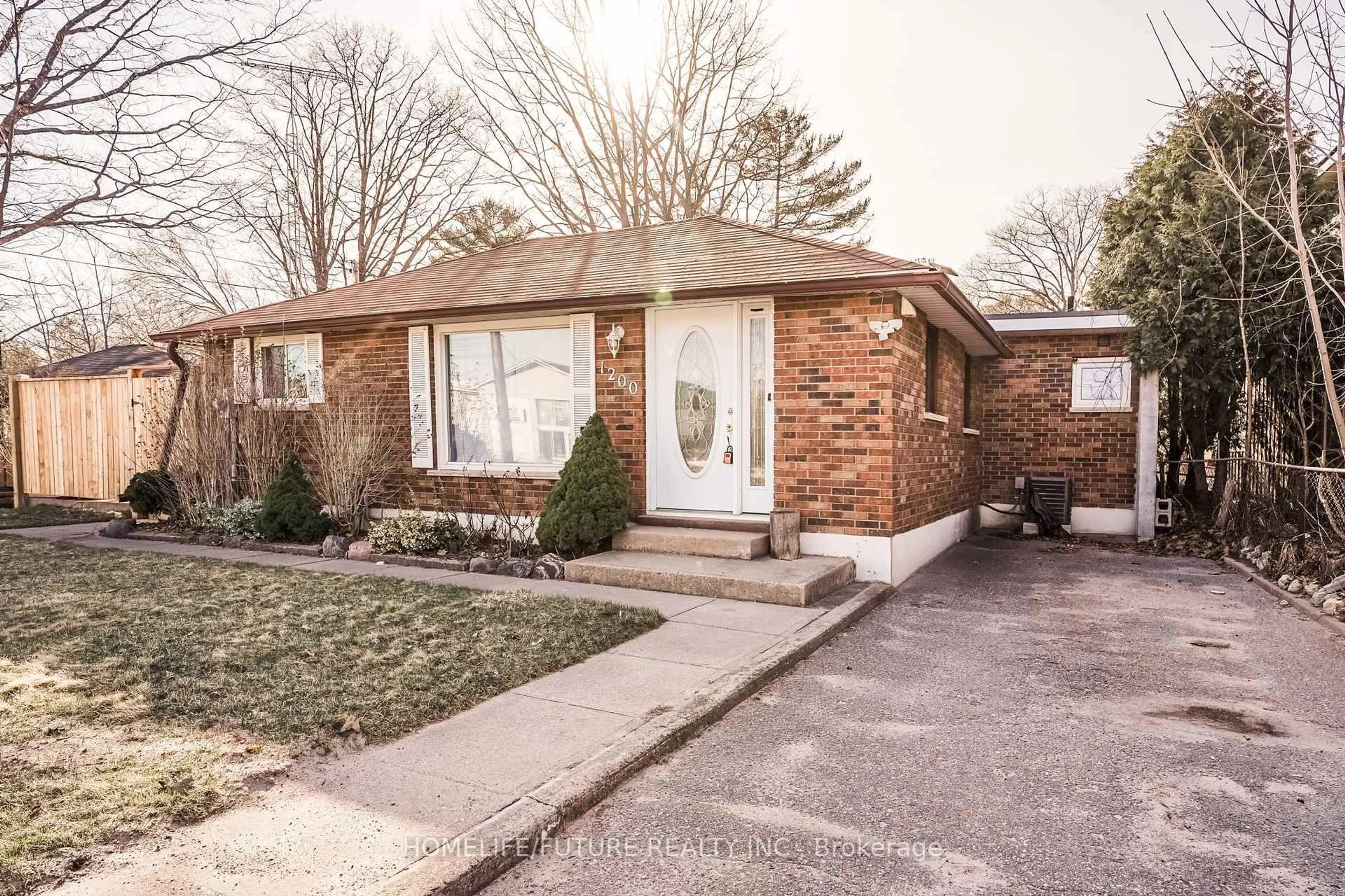 Home with brick exterior material, street for 1200 Mosley St, Wasaga Beach Ontario L9Z 2E7