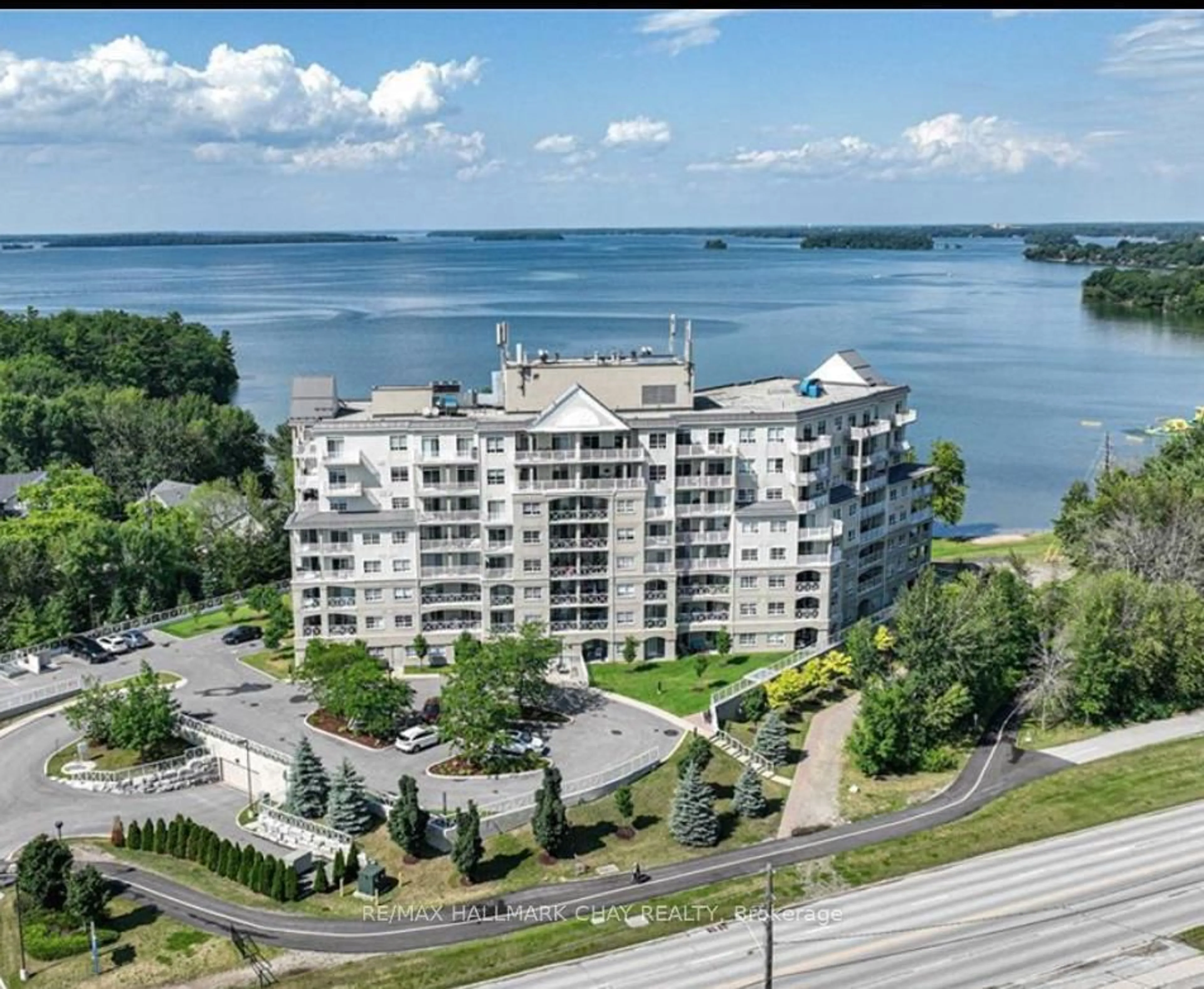 A pic from outside/outdoor area/front of a property/back of a property/a pic from drone, water/lake/river/ocean view for 354 Atherley Rd #102, Orillia Ontario L3V 0B8