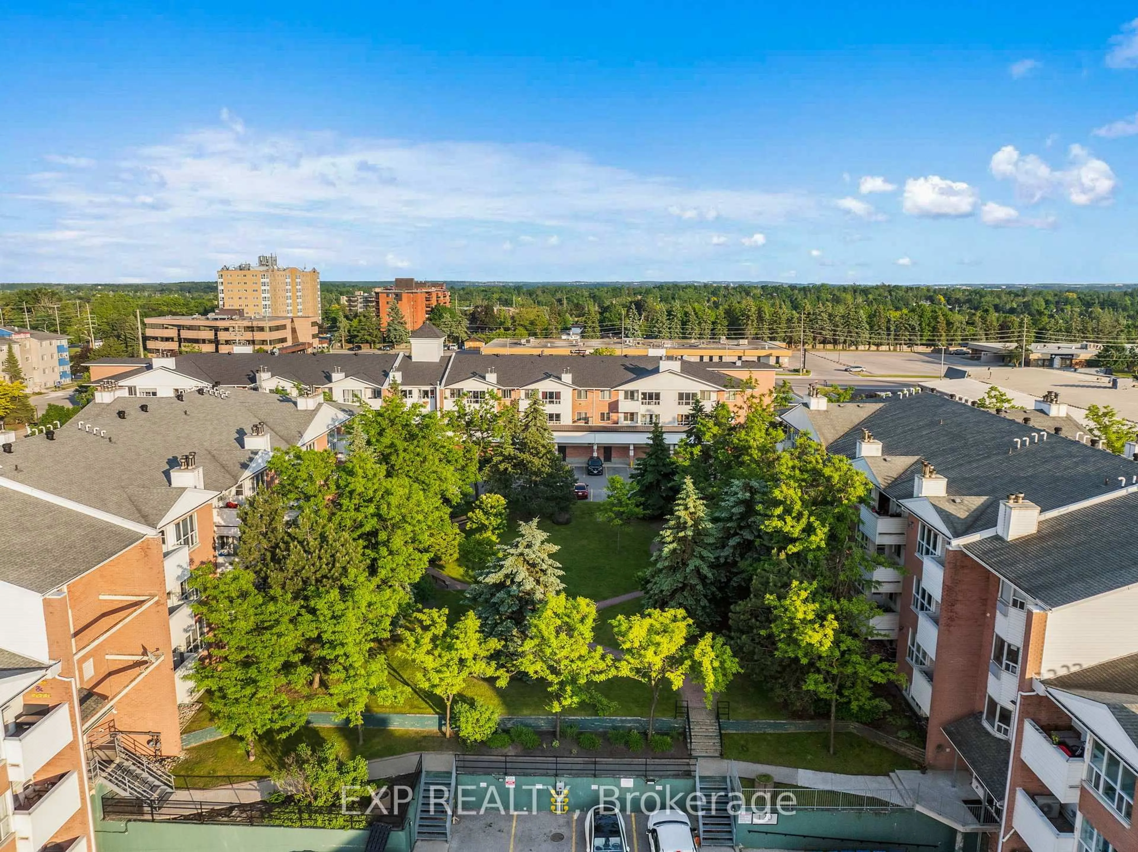 A pic from outside/outdoor area/front of a property/back of a property/a pic from drone, city buildings view from balcony for 120 Bell Farm Rd #201, Barrie Ontario L4M 6J2
