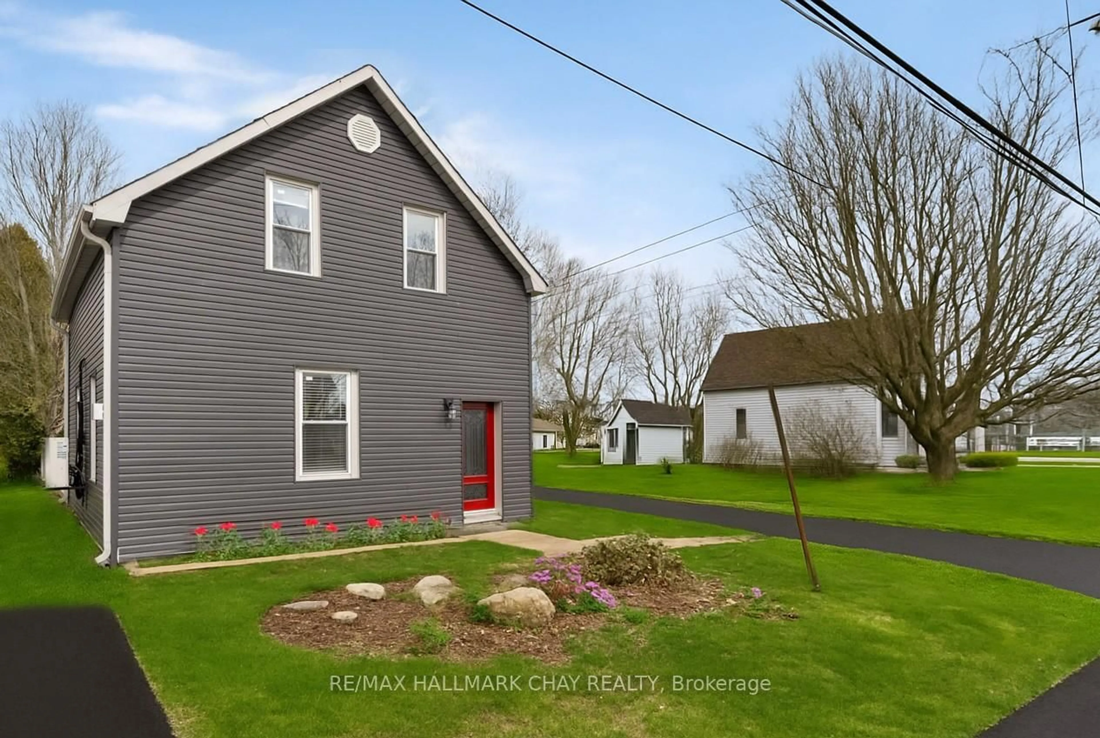Home with vinyl exterior material, street for 17 County Road 6 Rd, Tiny Ontario L0L 2J0