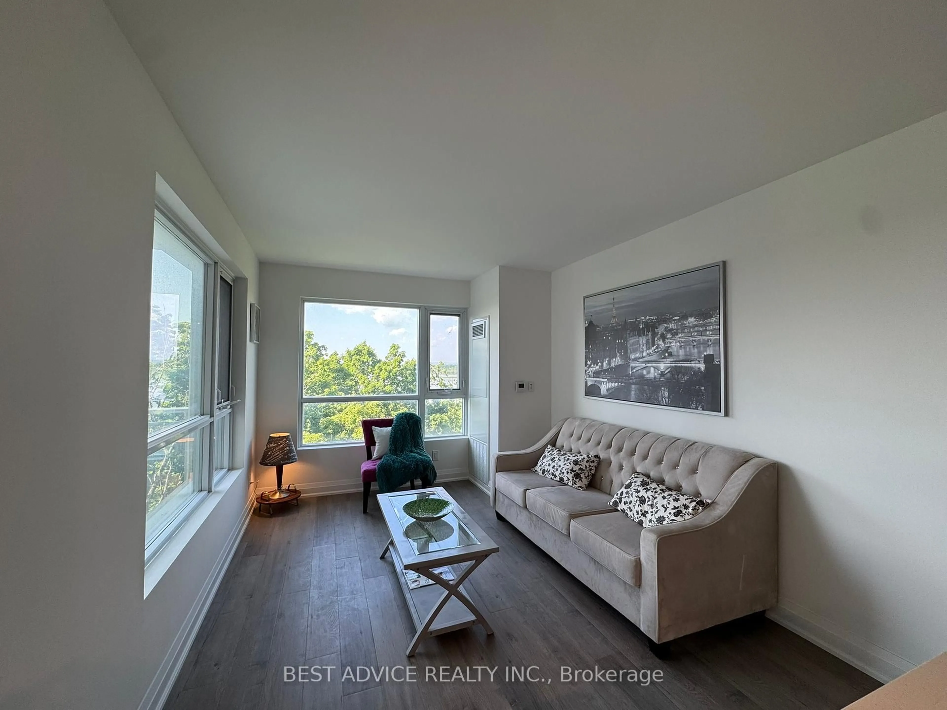 Living room with furniture, wood/laminate floor for 58 Lakeside Terr #706, Barrie Ontario L4M 0L5