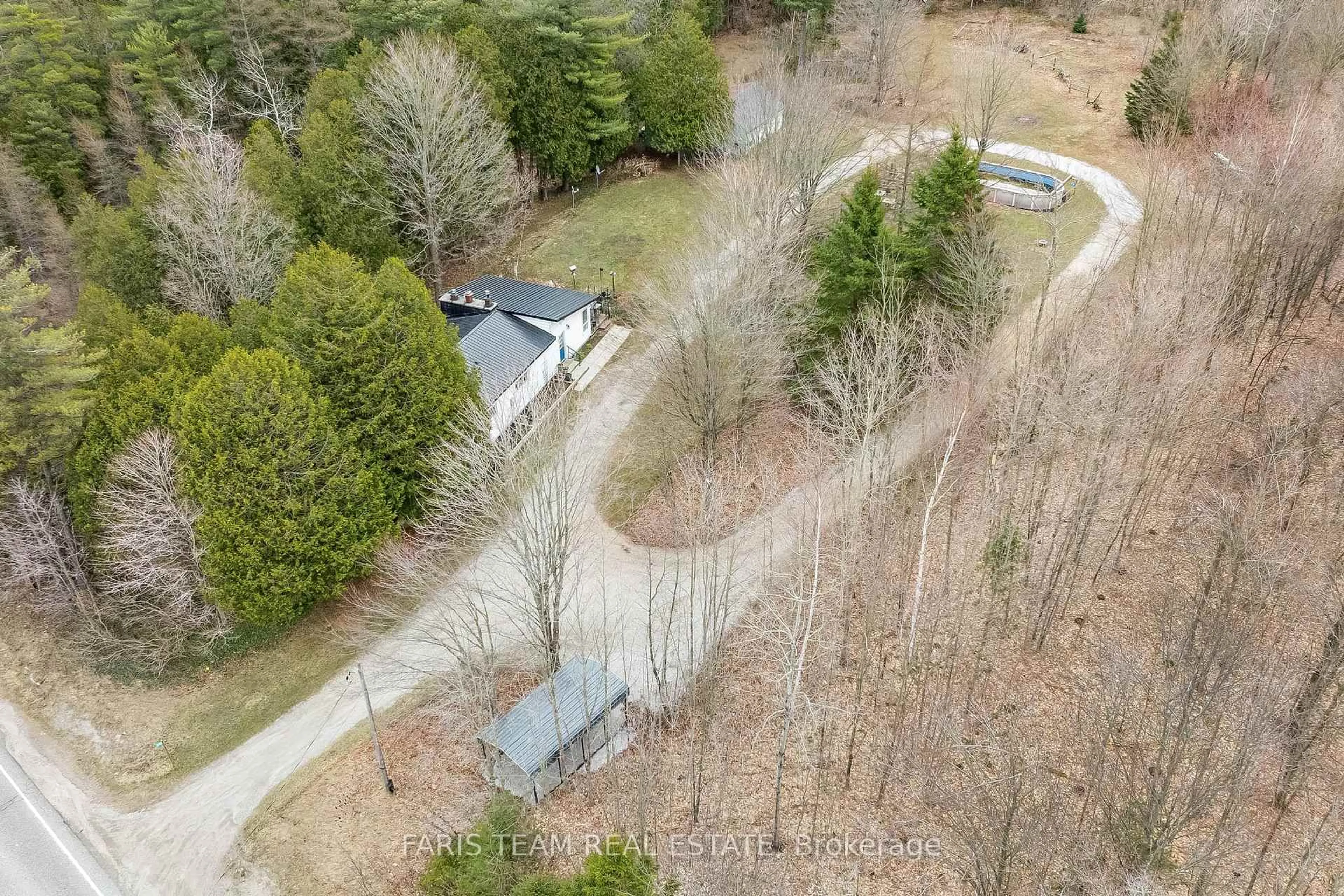 A pic from outside/outdoor area/front of a property/back of a property/a pic from drone, forest/trees view for 1983 Horseshoe Valley Rd, Oro-Medonte Ontario L4M 4Y8