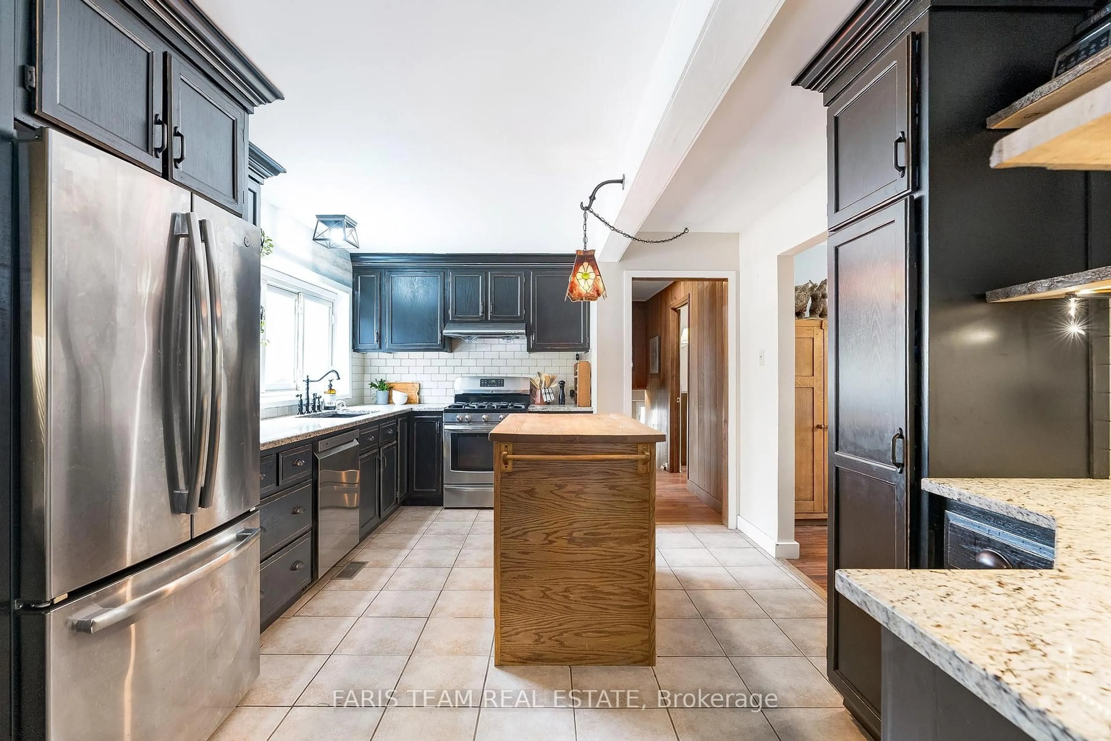 Contemporary kitchen, ceramic/tile floor for 1983 Horseshoe Valley Rd, Oro-Medonte Ontario L4M 4Y8