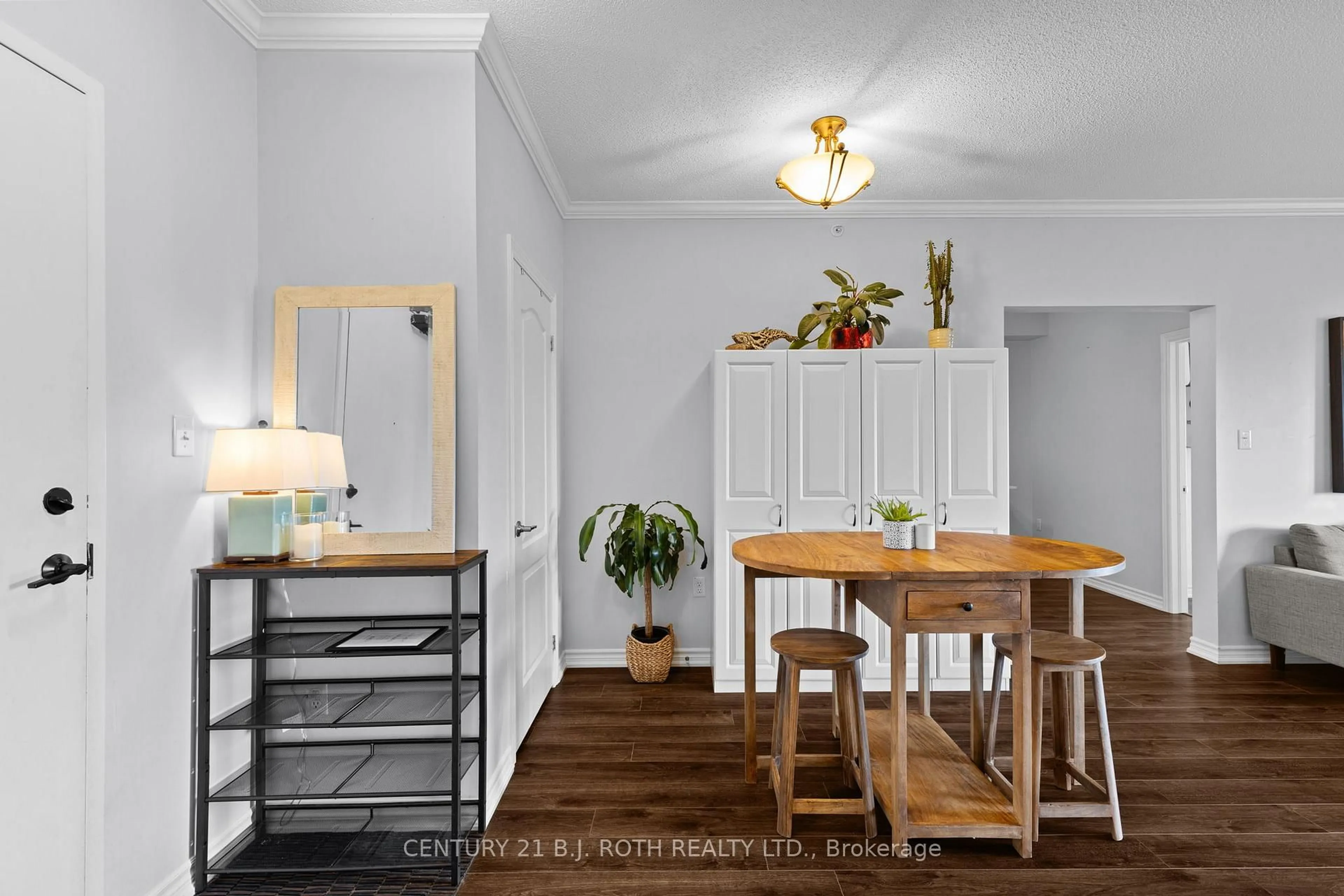 Dining room, wood/laminate floor for 100 Dean Ave #307, Barrie Ontario L9J 0H1