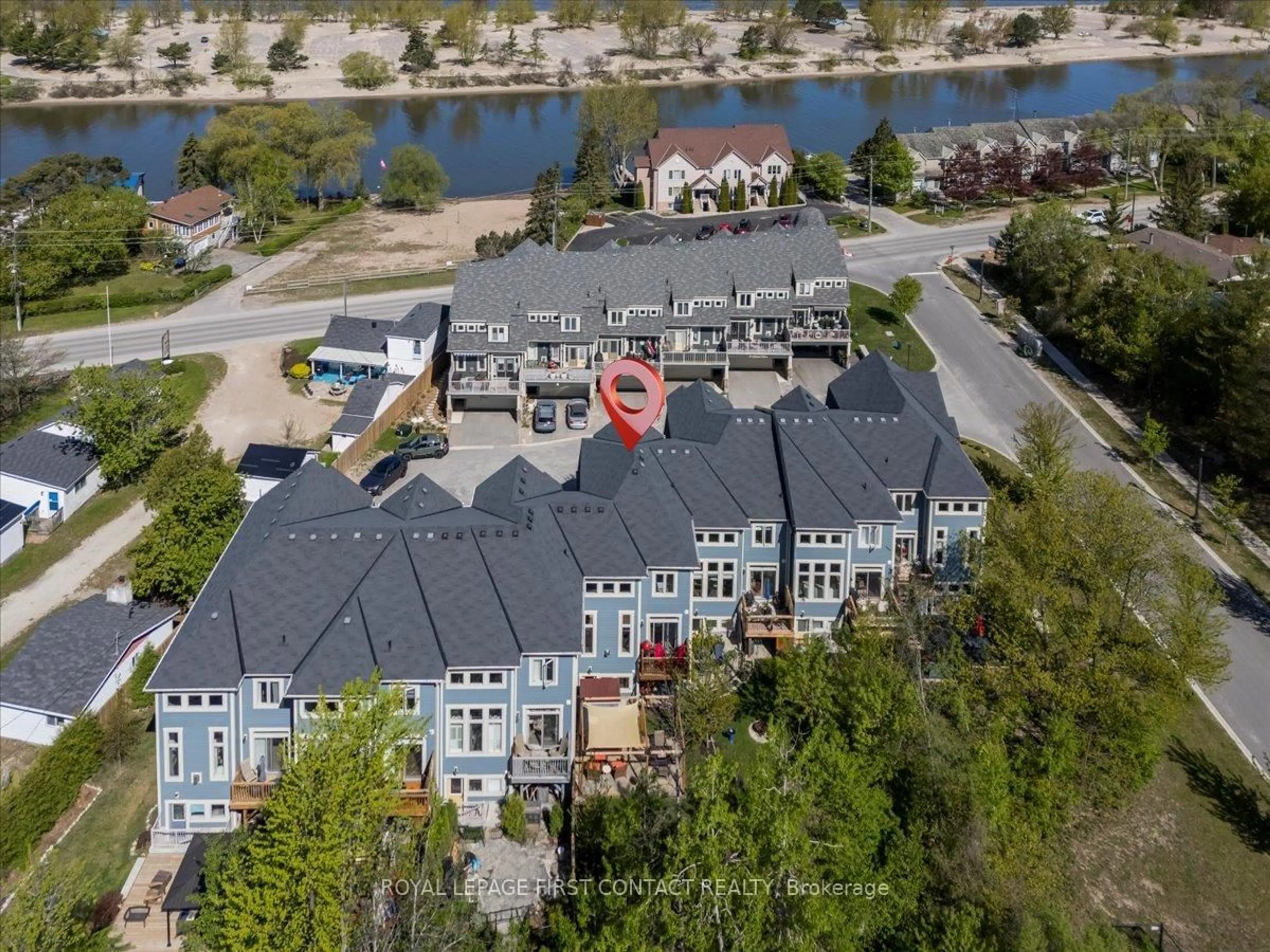 A pic from outside/outdoor area/front of a property/back of a property/a pic from drone, water/lake/river/ocean view for 8 Nautical Lane, Wasaga Beach Ontario L9Z 0G1