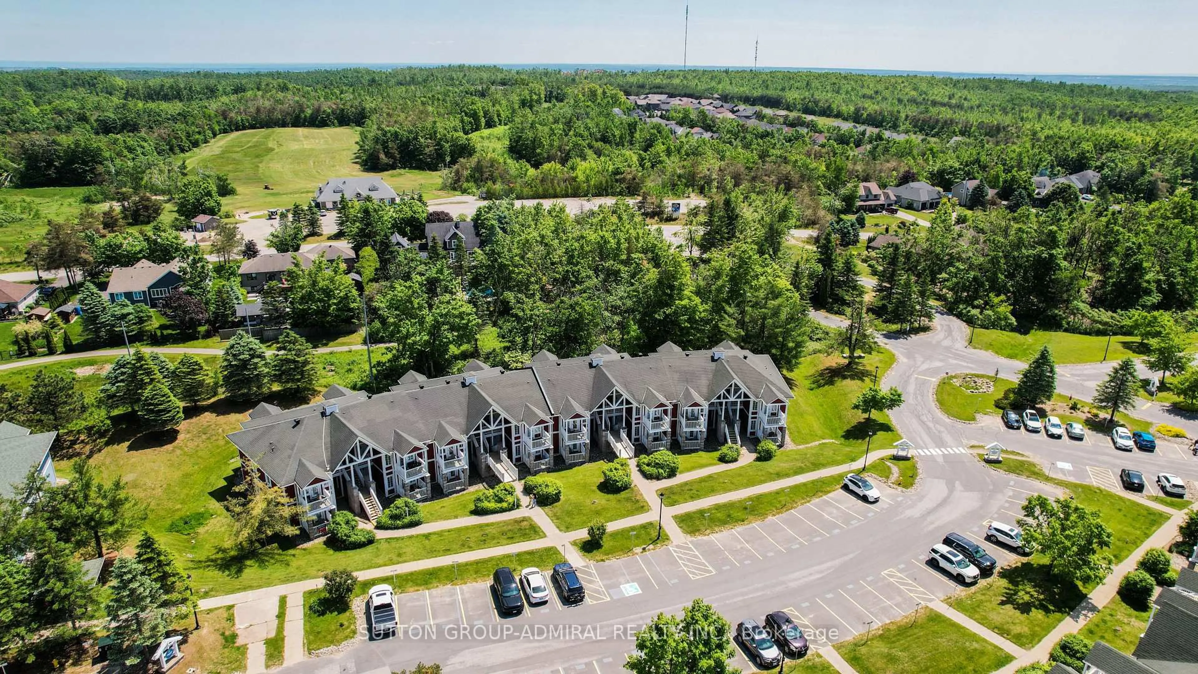A pic from outside/outdoor area/front of a property/back of a property/a pic from drone, unknown for 90 Highland Dr #2010, Oro-Medonte Ontario L0L 2L0